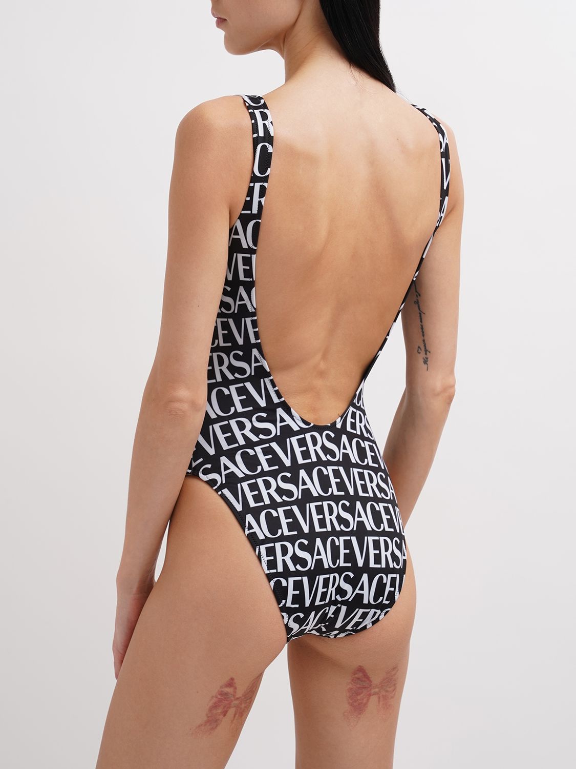 One-piece with white and black logo