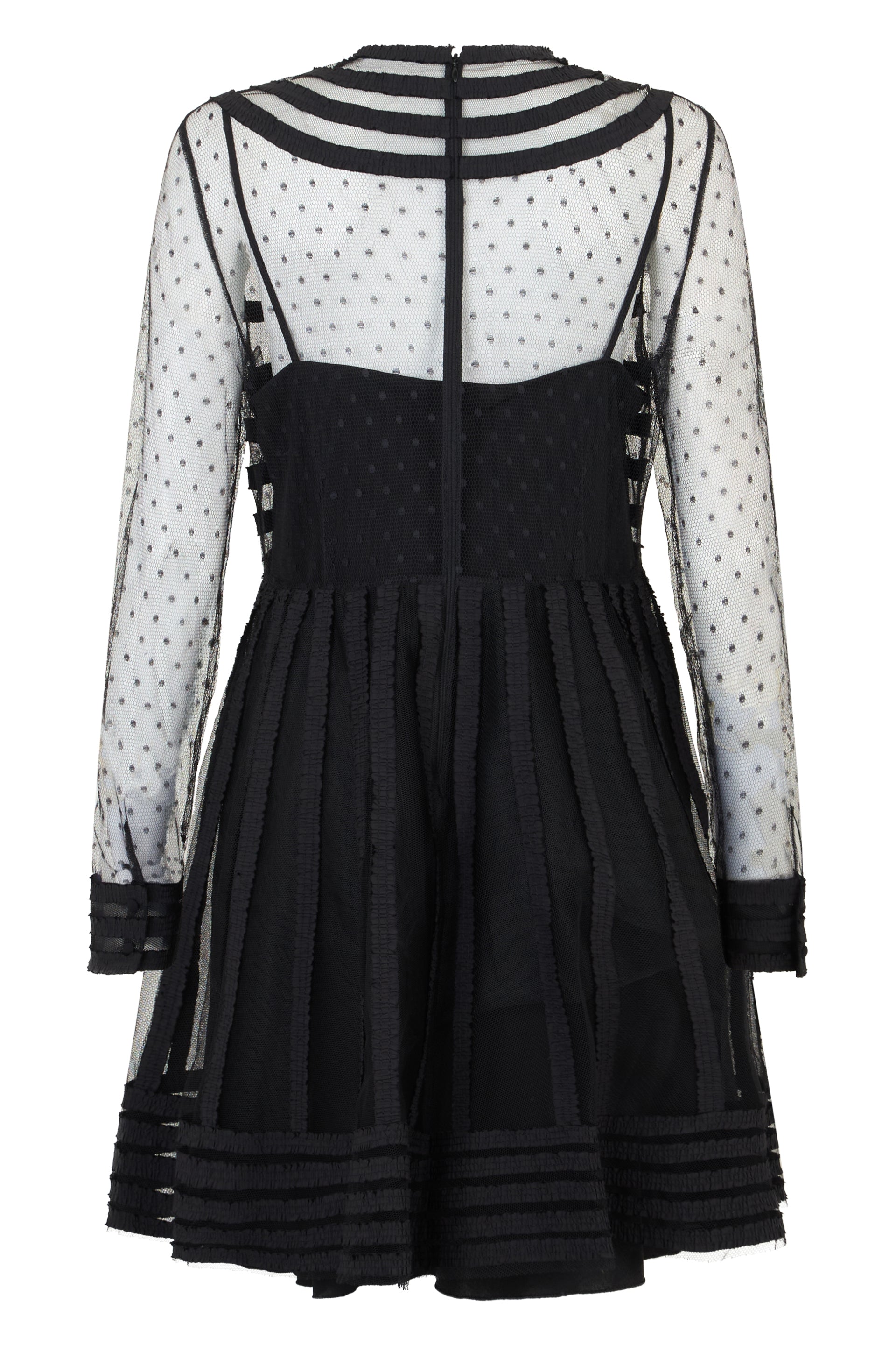 Elegant black dress with structured bodice and sheer sleeves.