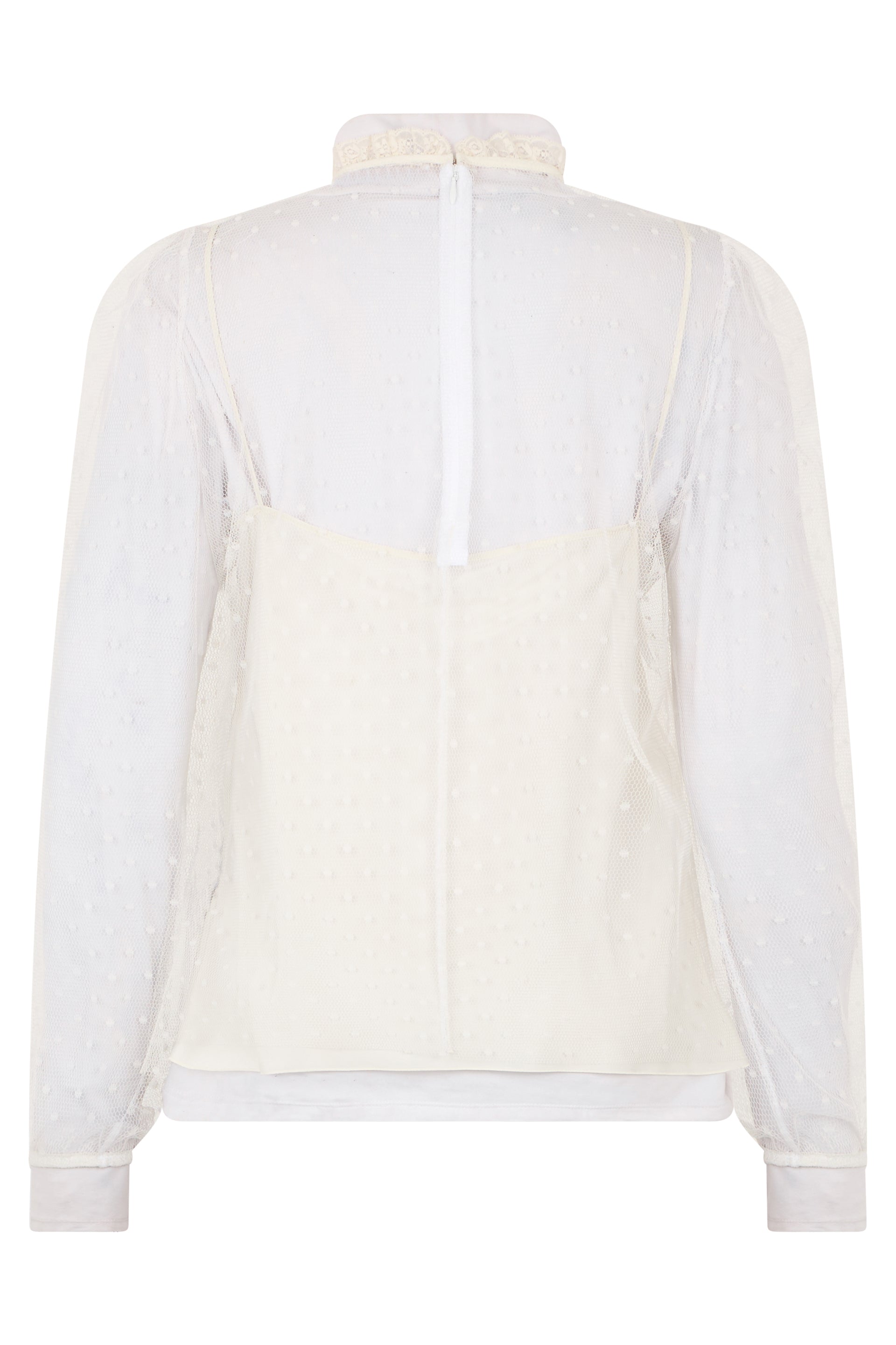 White cream colored blouse with long sleeves and an elegant and sophisticated design.