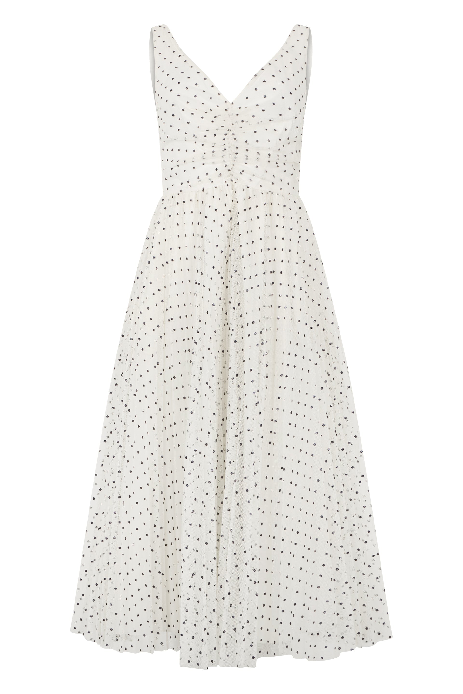 Elegant white dress with black polka dots, elegant and versatile.