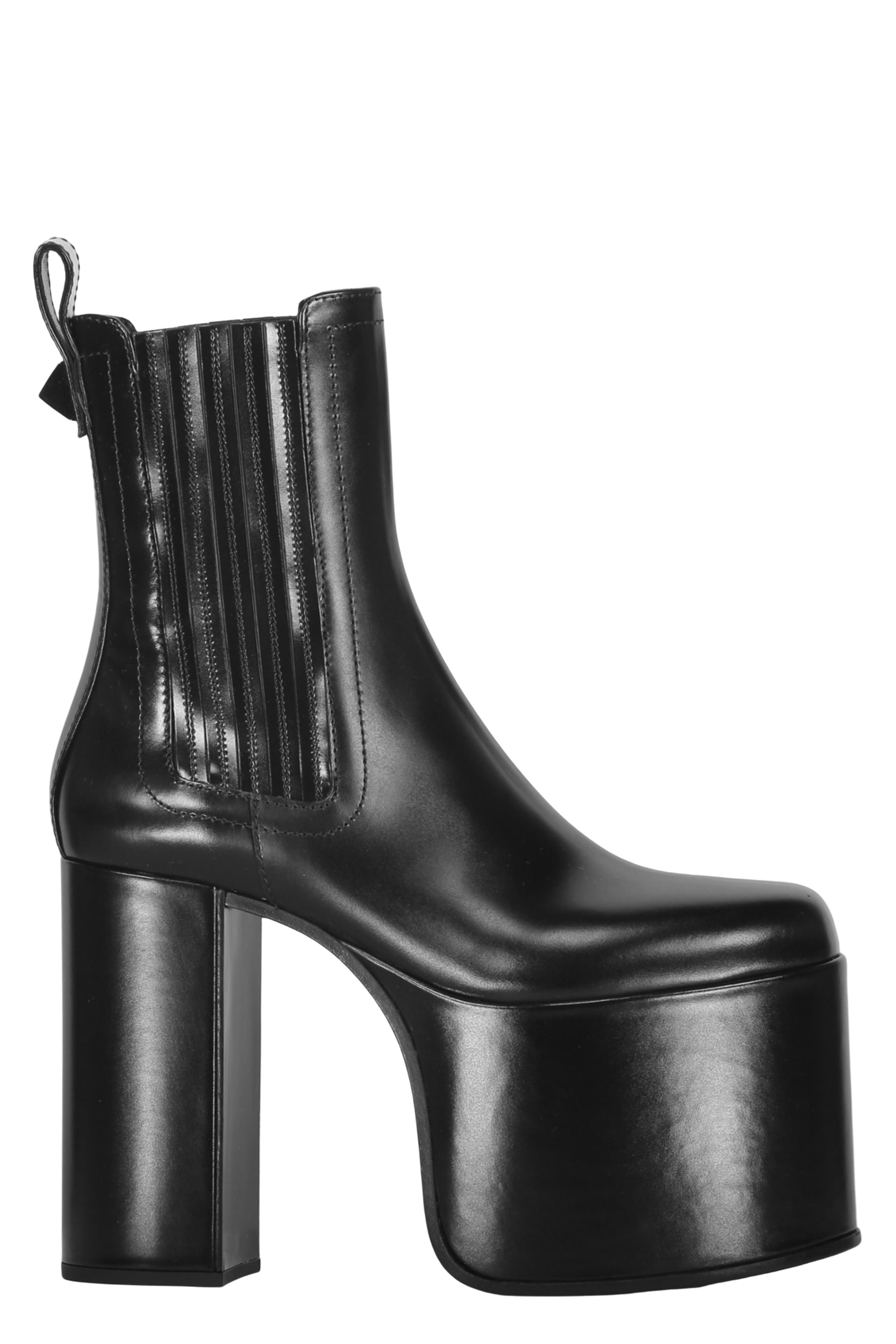 Shiny black boots with thick soles