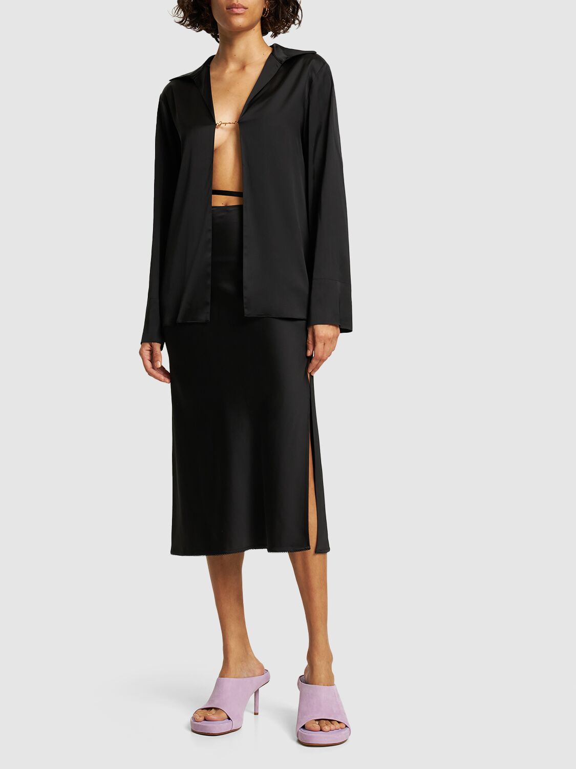 Elegant black shirt with deep neckline