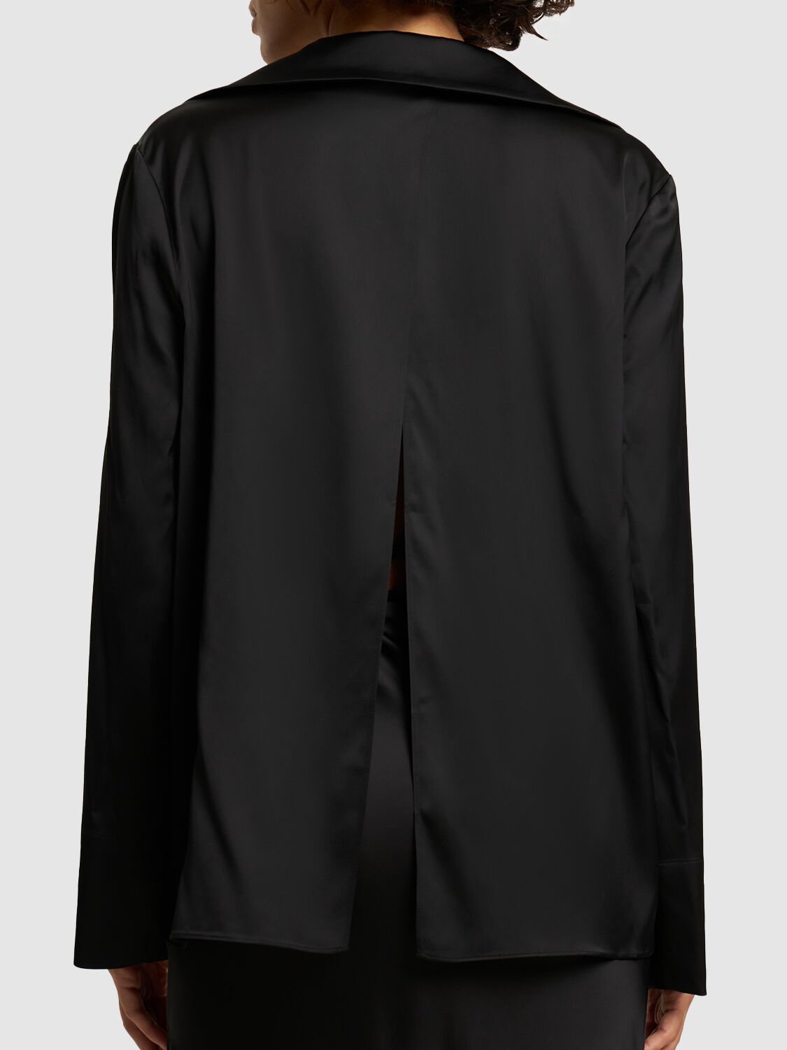 Elegant black shirt with deep neckline