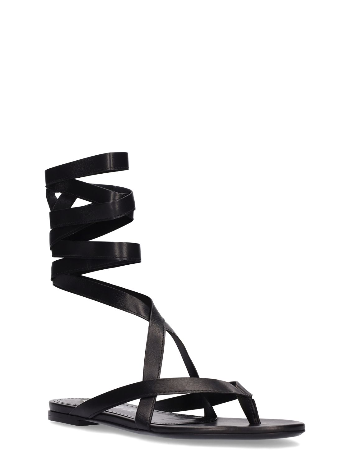 Black low sandal with woven straps elegant