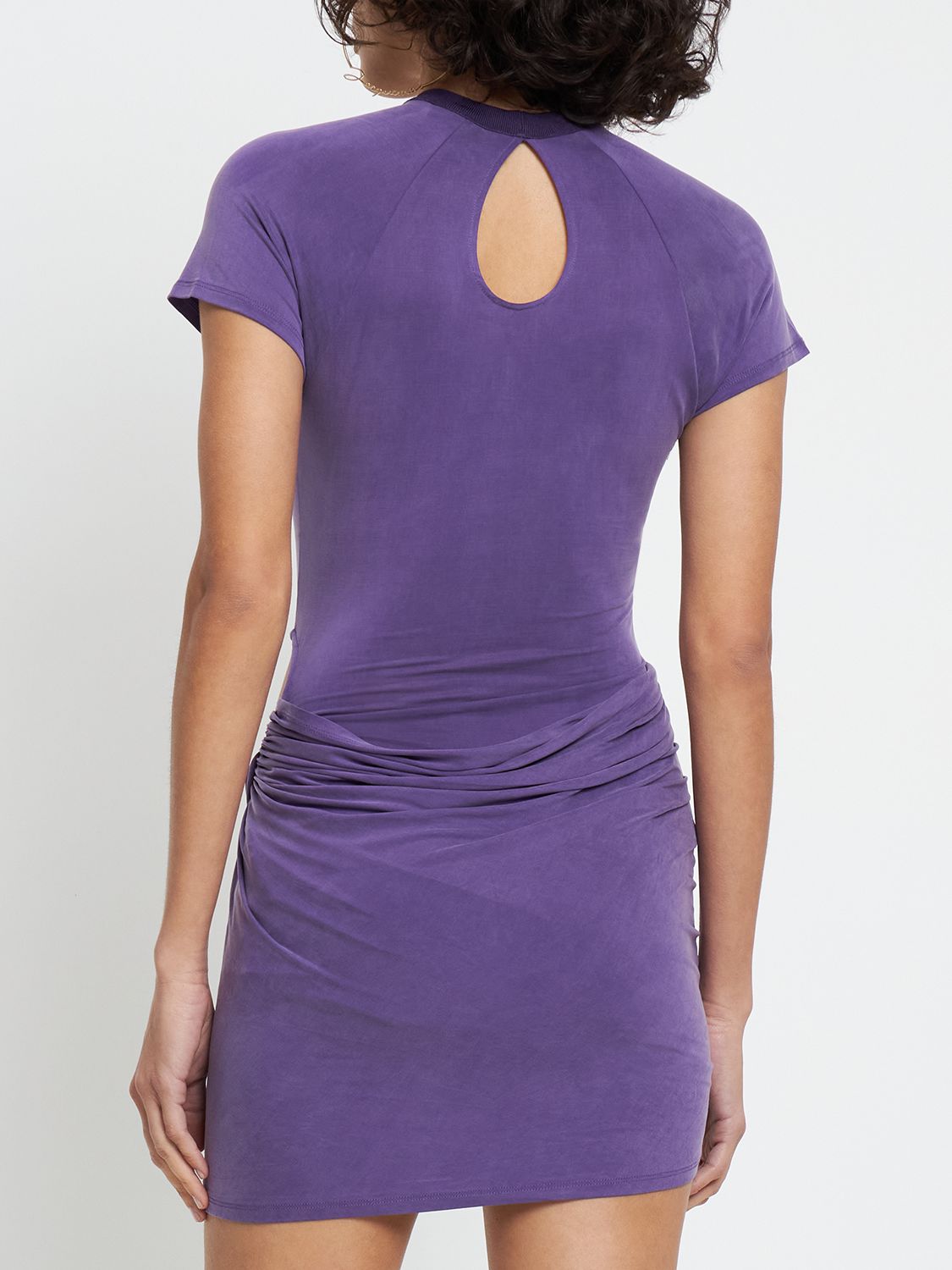 Fitted purple dress with cut-out details