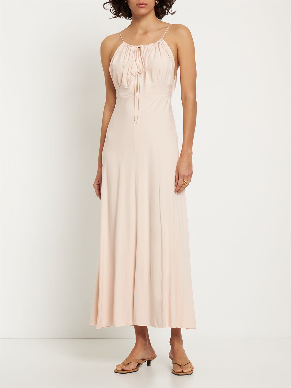 Elegant long dress without sleeves in beige