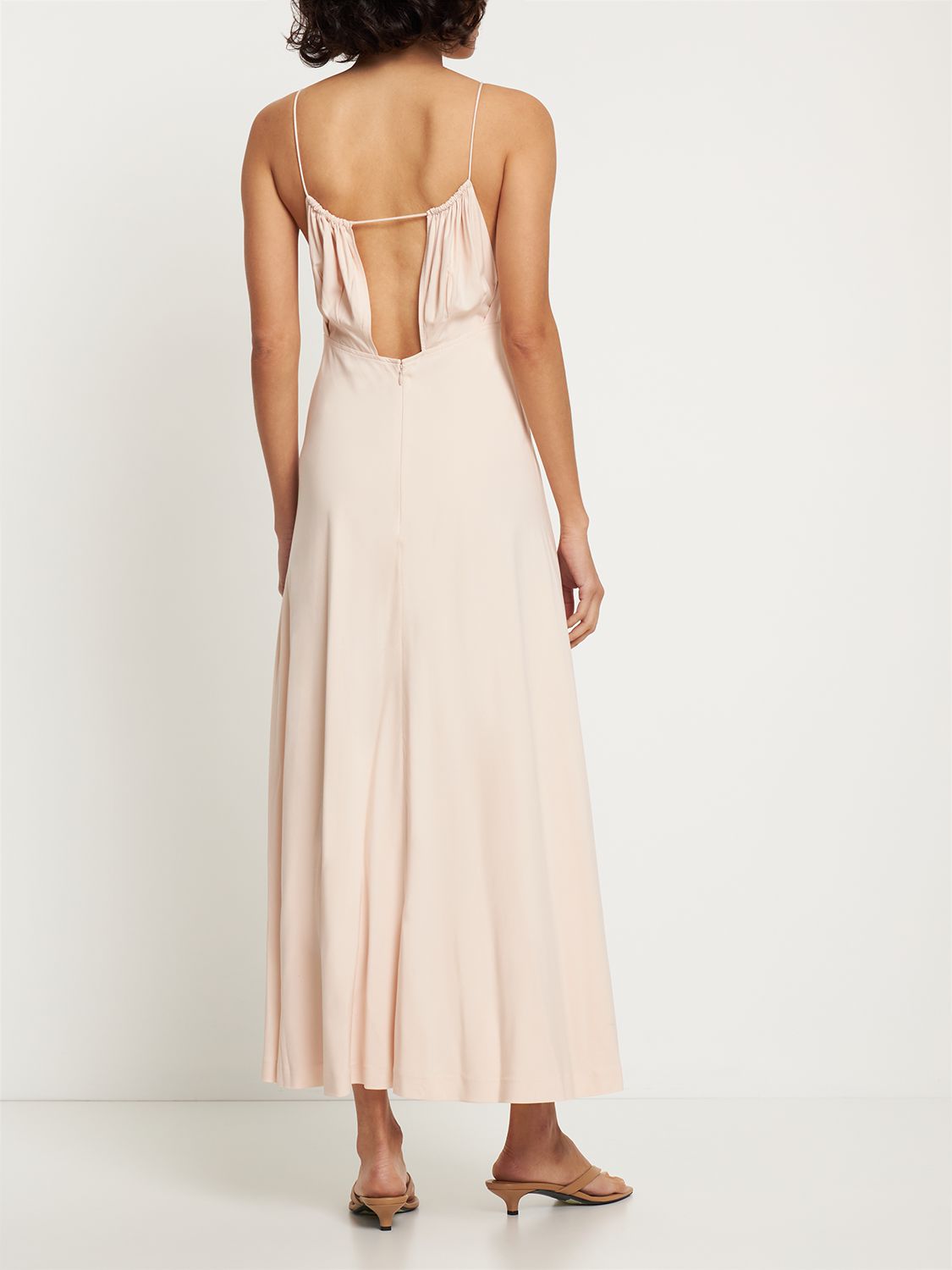 Elegant long dress without sleeves in beige