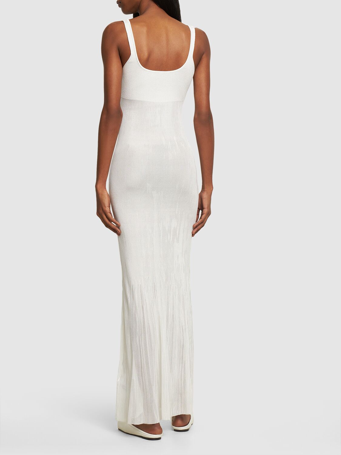 Long white dress with elegant neckline