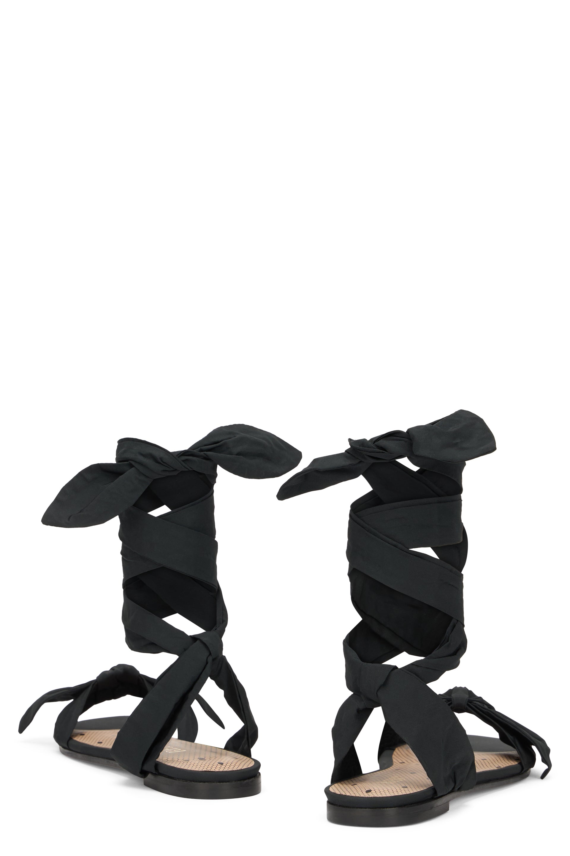 Elegant black sandal with woven straps.