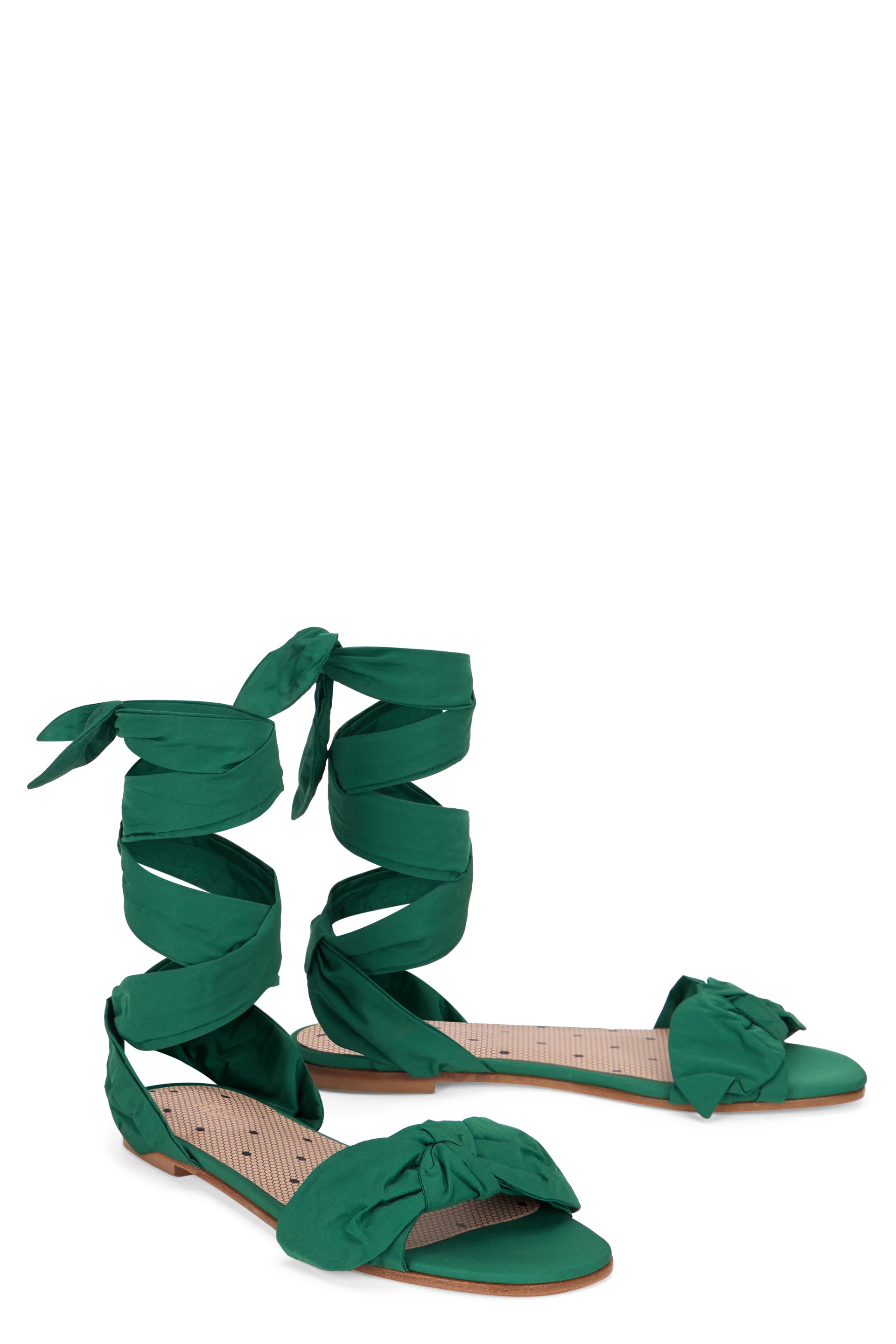 Elegant bright green sandals with laces.