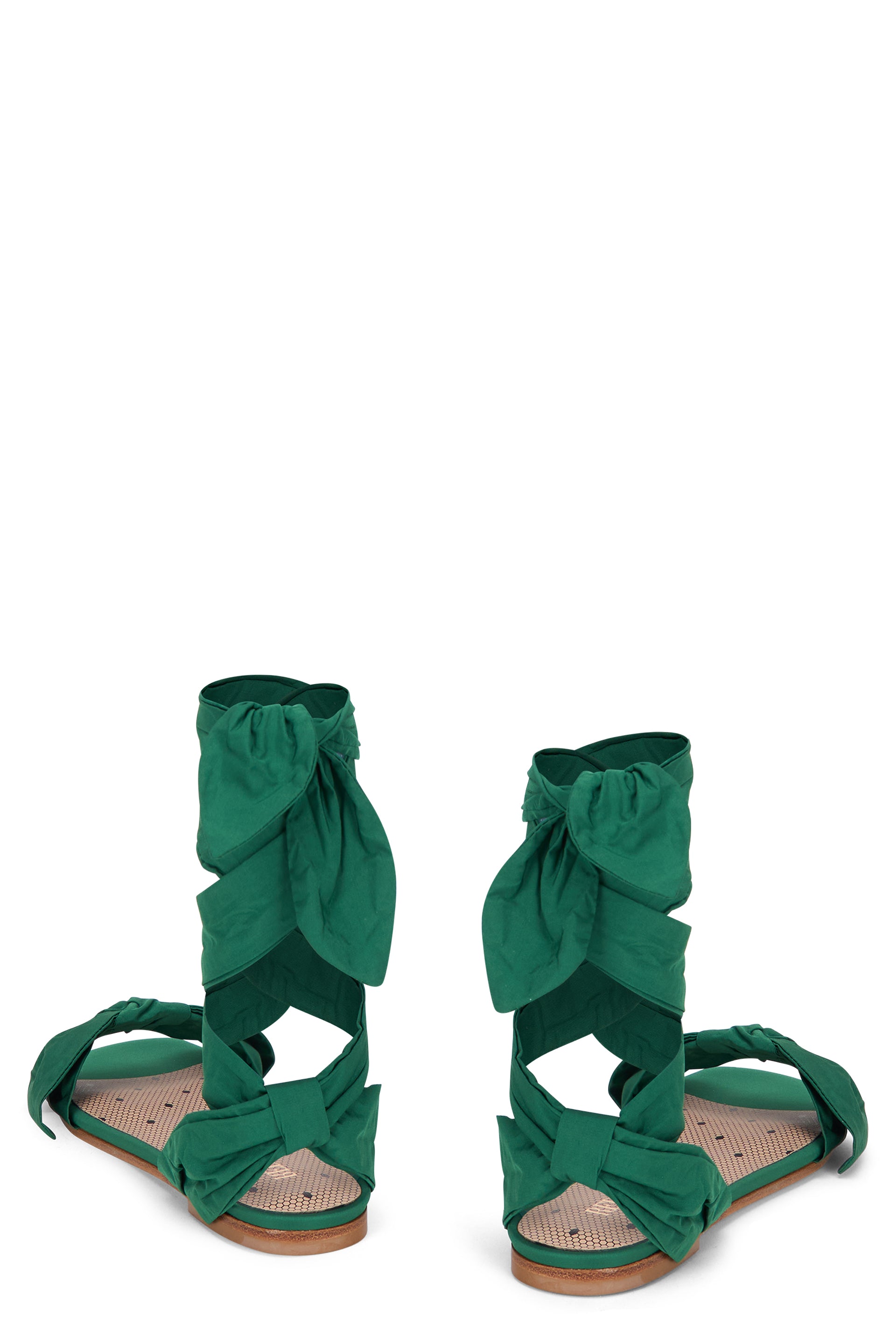 Elegant bright green sandals with laces.
