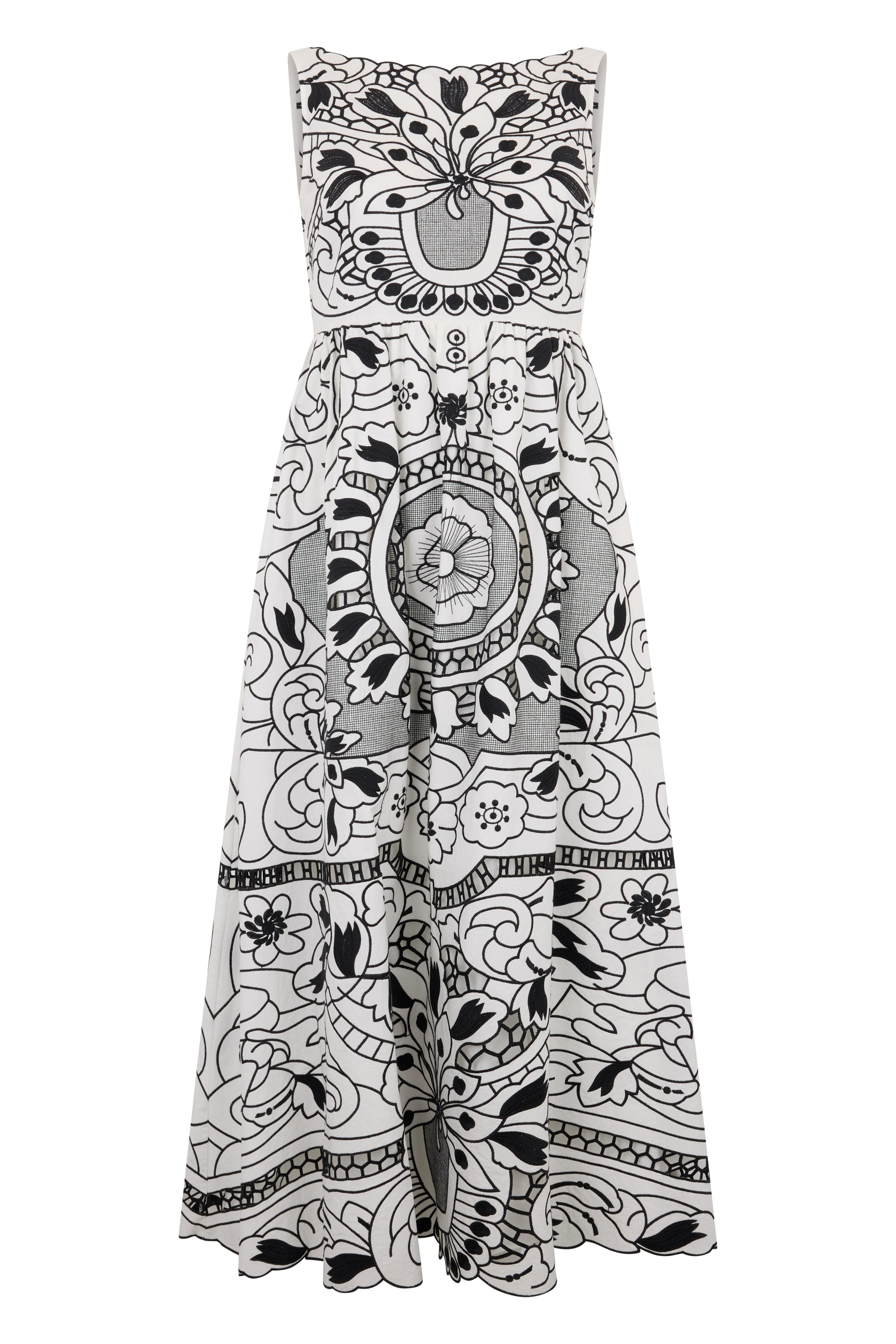 Elegant dress without sleeves in white color with black print.