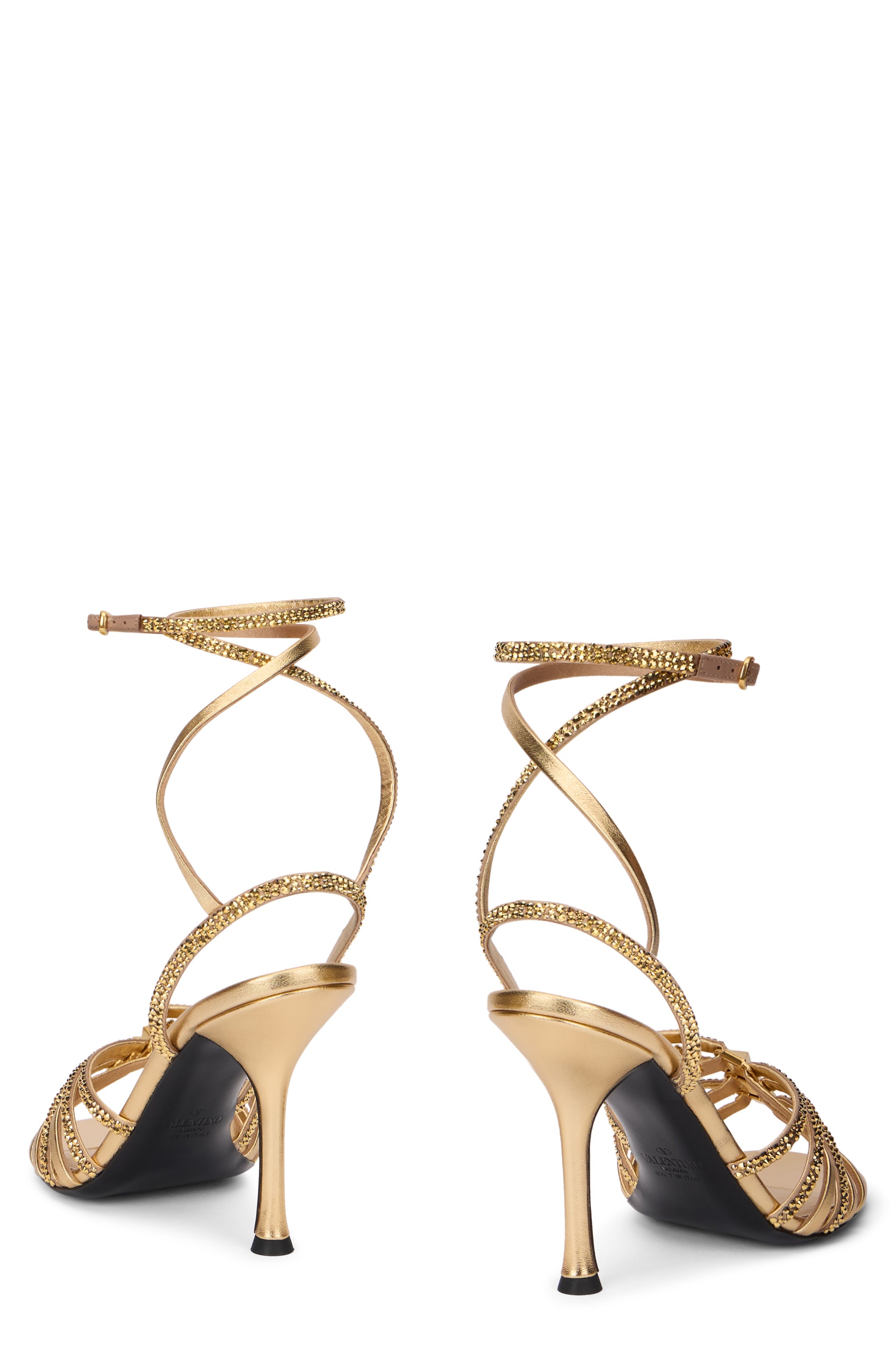 Elegant high-heeled golden shoes