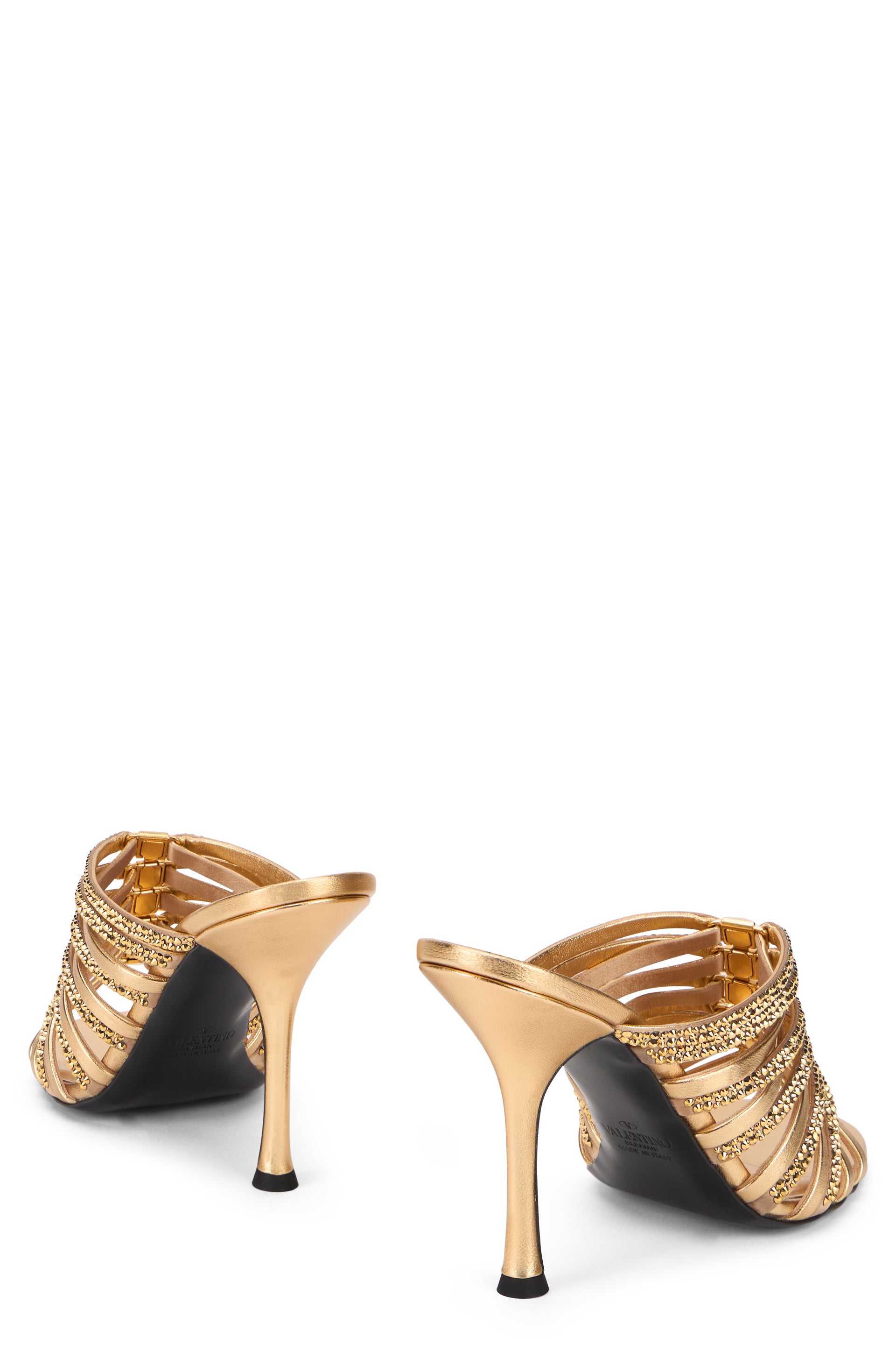 Mules in leather and fabric