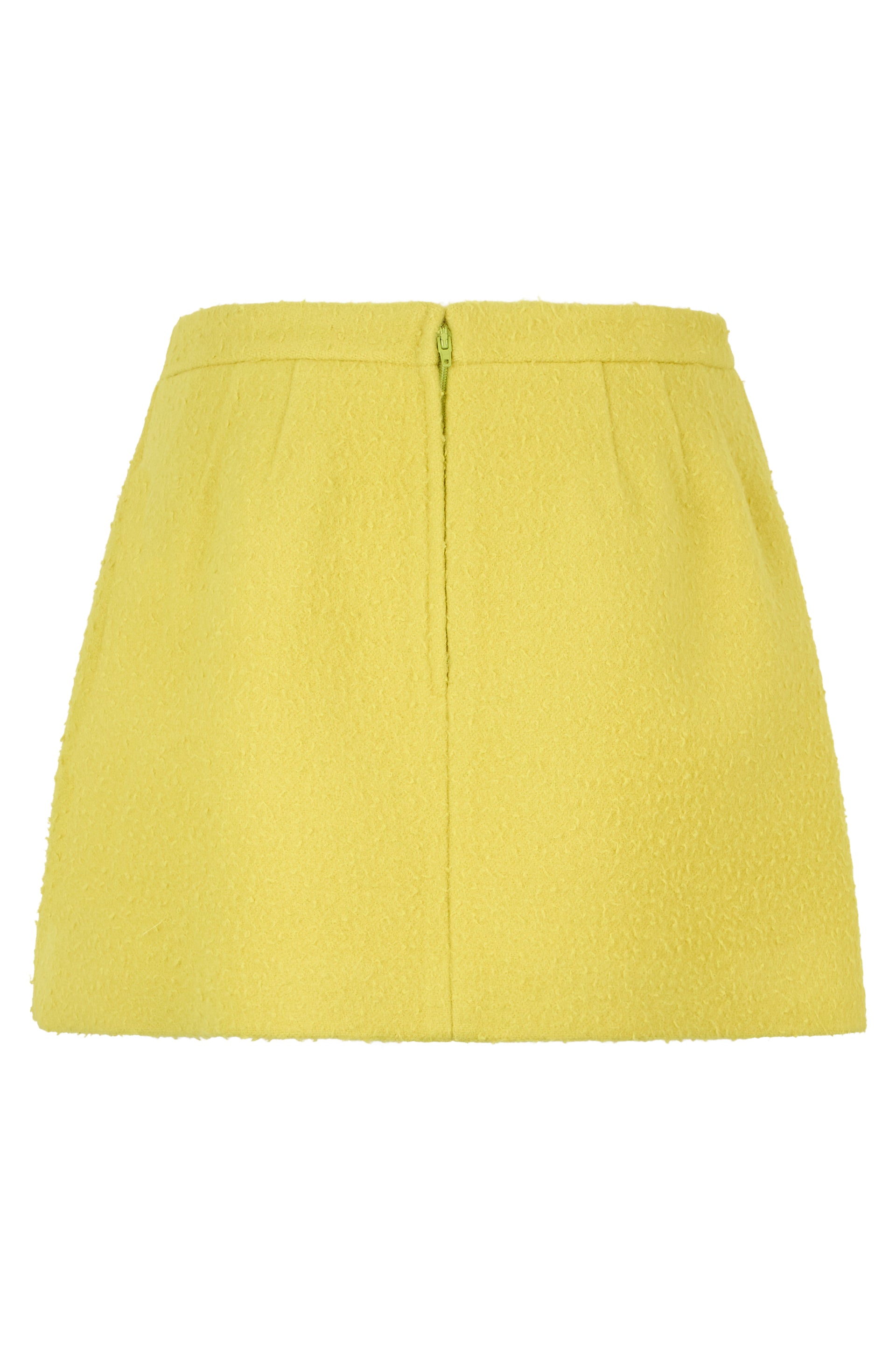 Short yellow skirt, minimal and versatile.