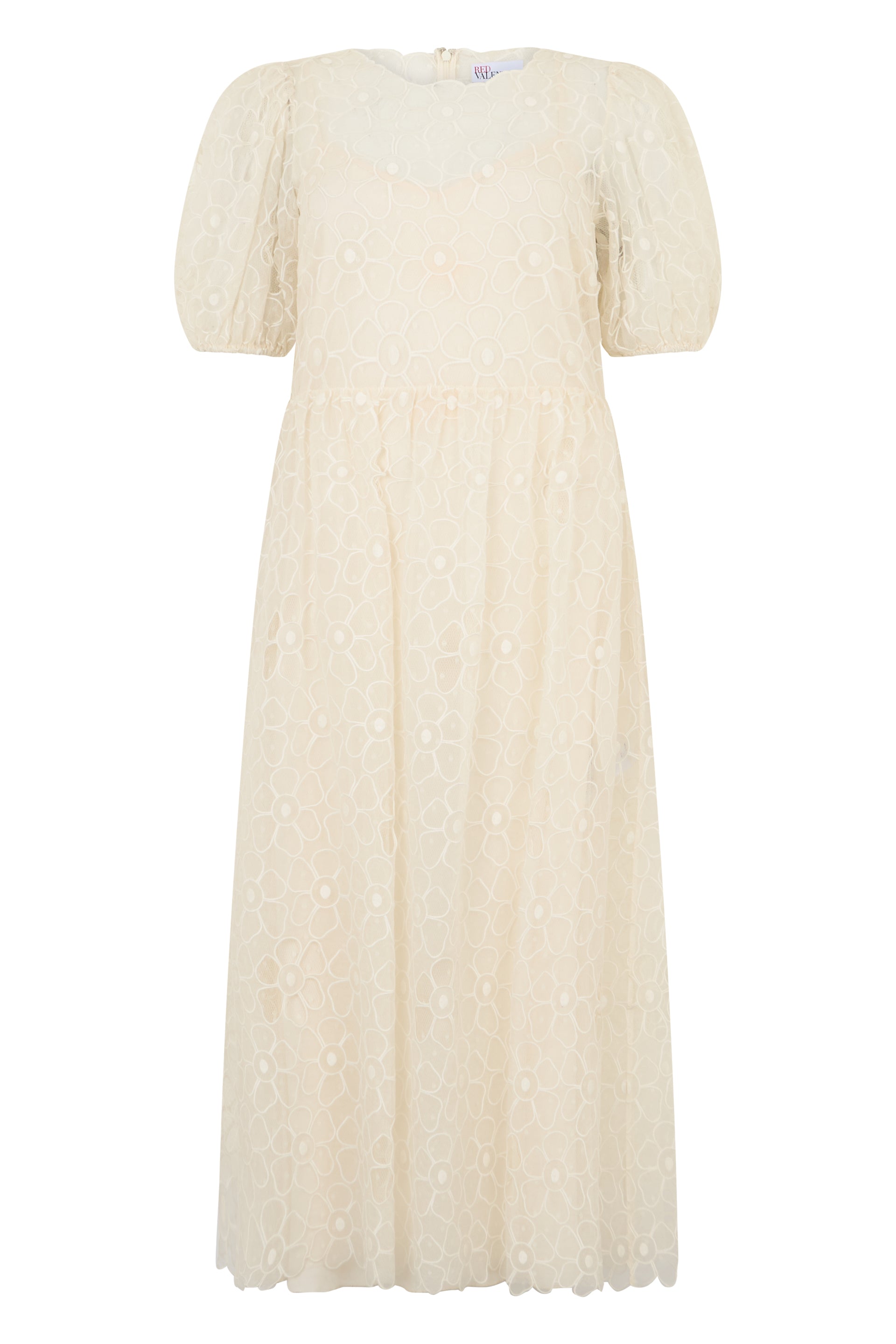 Long dress in off-white color with short puff sleeves.