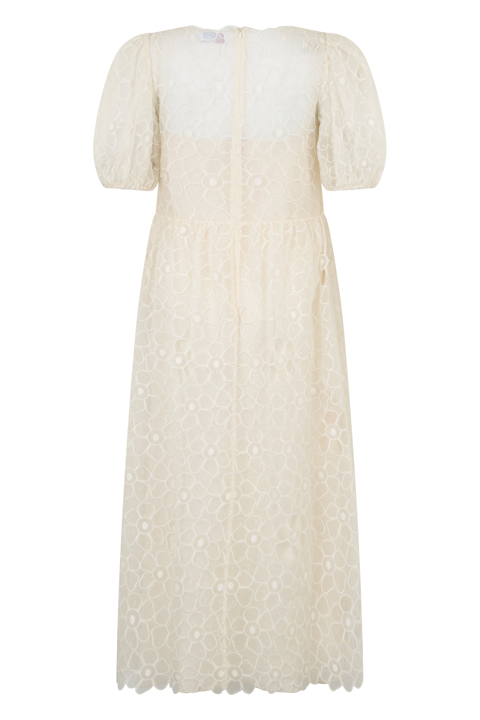 Long dress in off-white color with short puff sleeves.