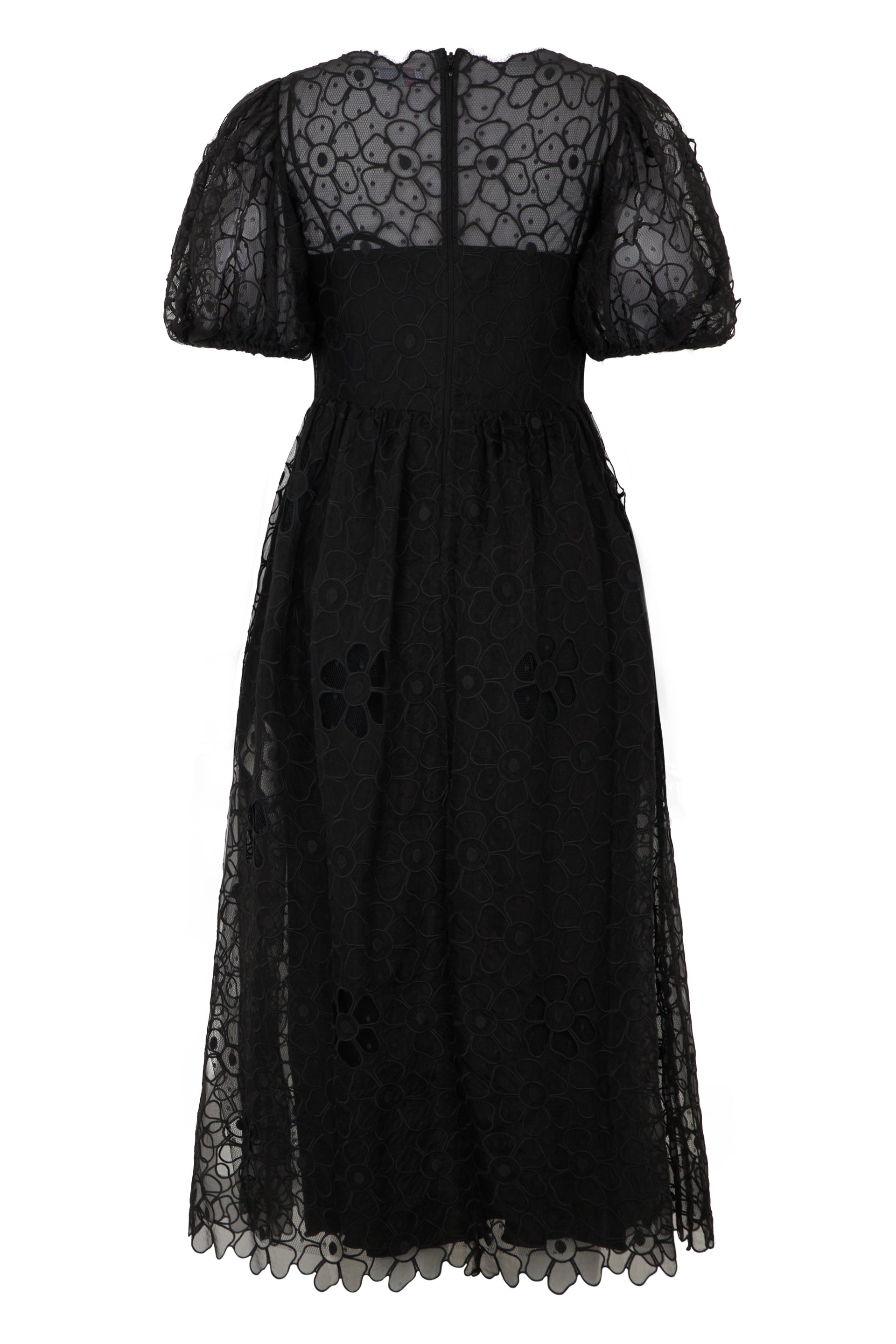 Elegant long black dress with tulle and flowers.