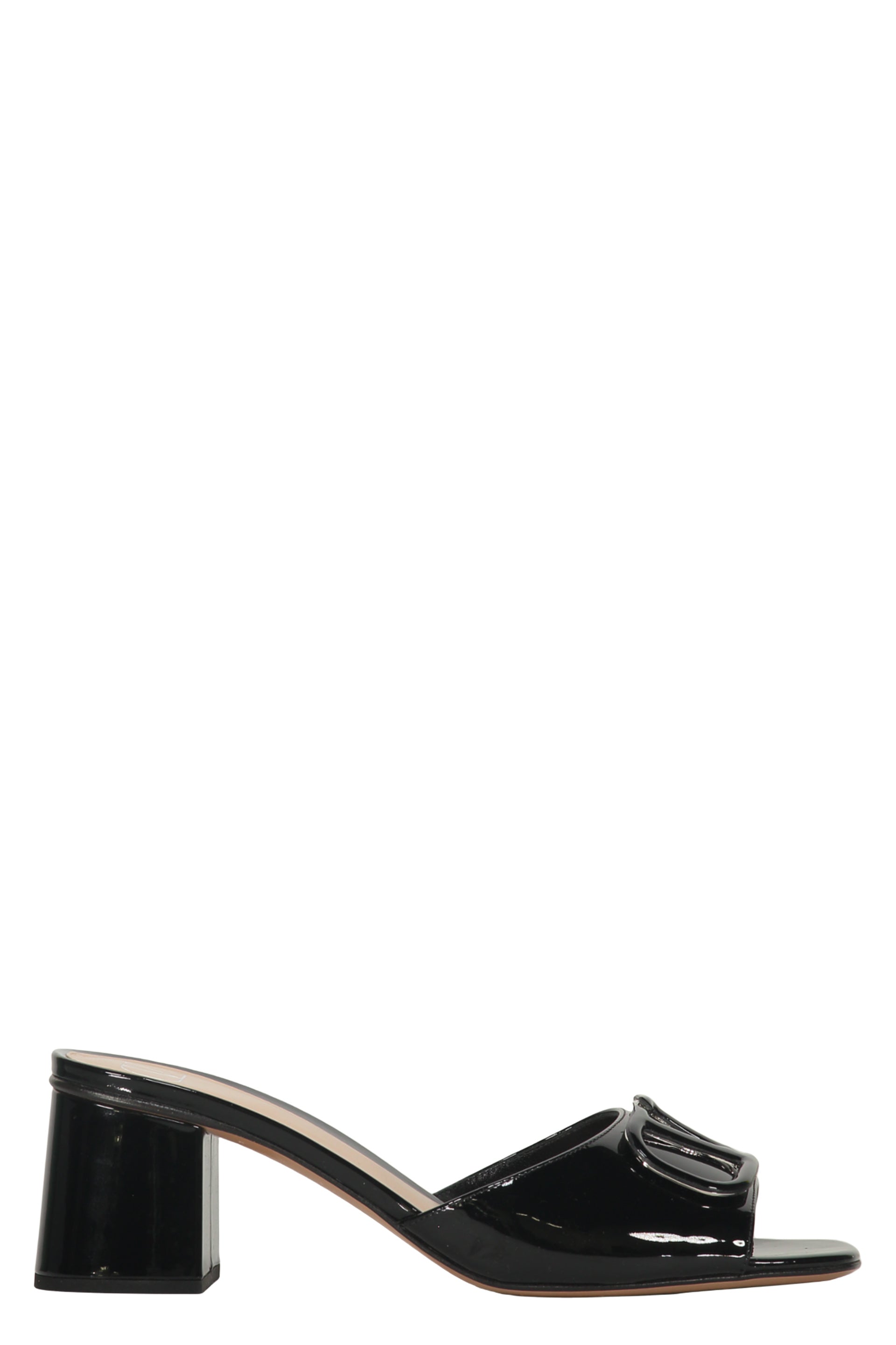 Mule in black leather with elegant heel