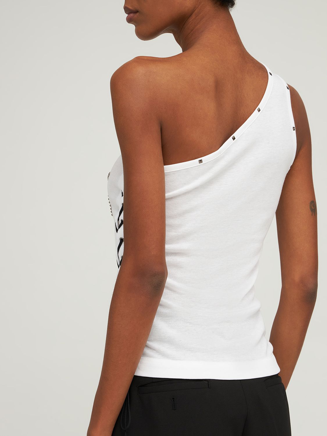 Asymmetrical one-shoulder top with "ROCK" print
