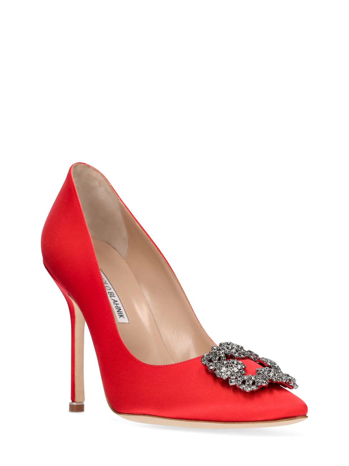 Decolletage with high satin red heels