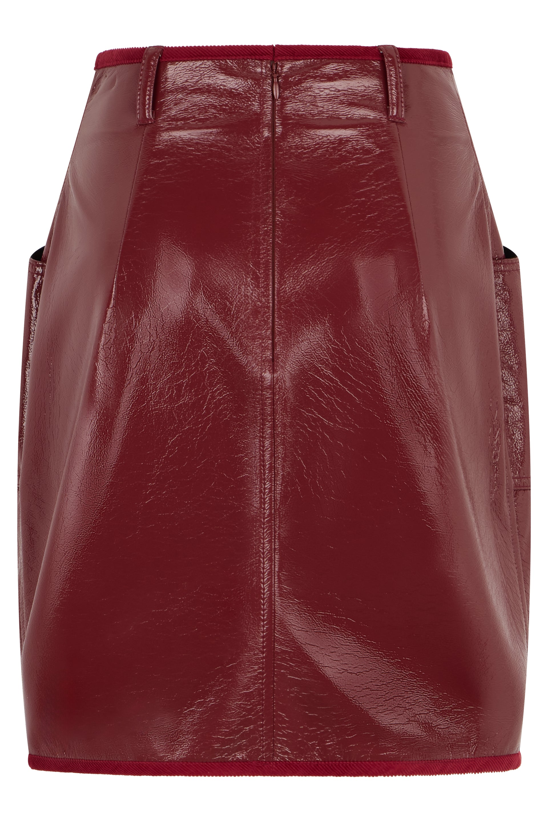 Short skirt in eco-leather burgundy with elegant pockets.