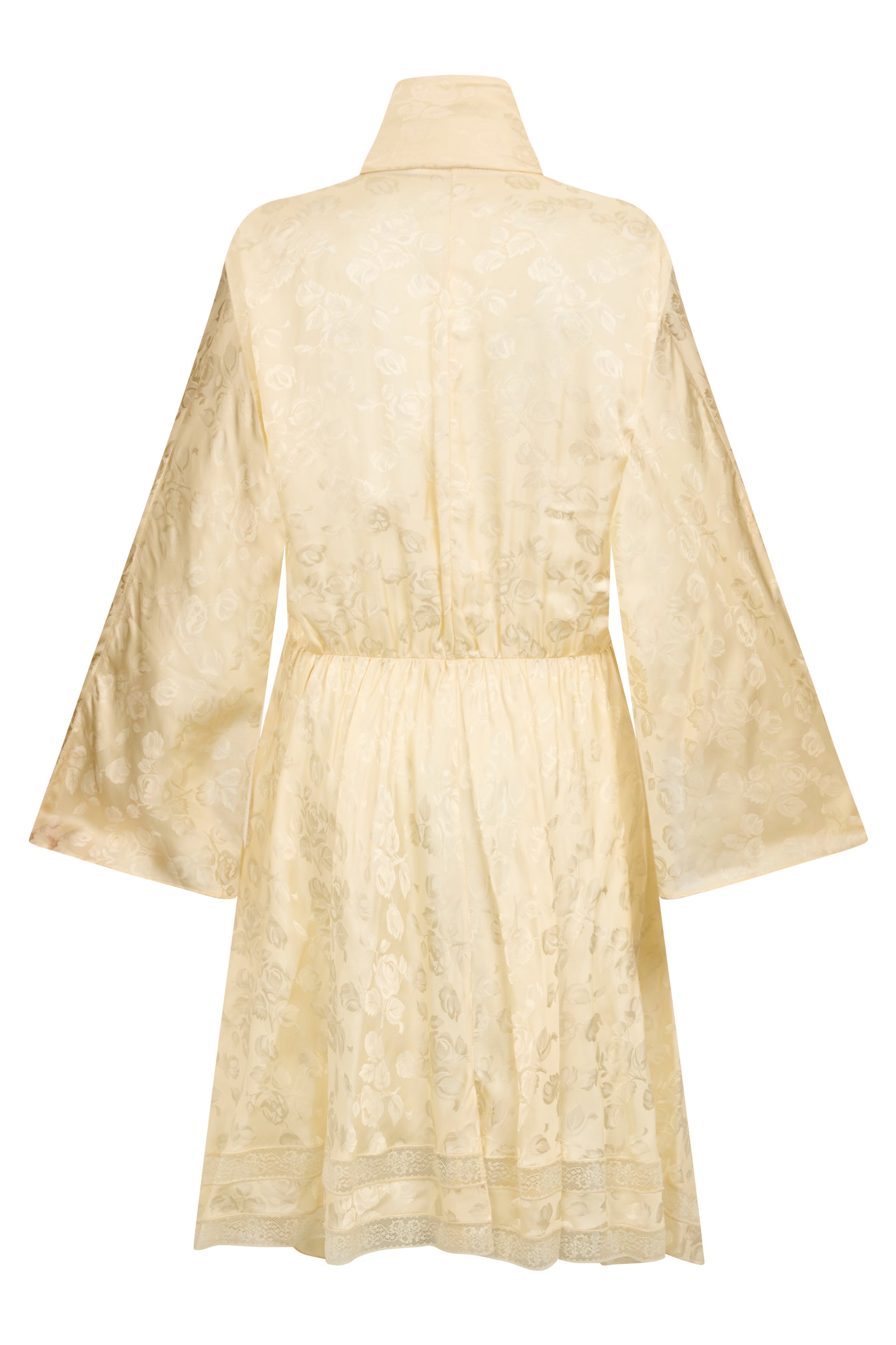 Light yellow elegant dress in soft and versatile fabric.