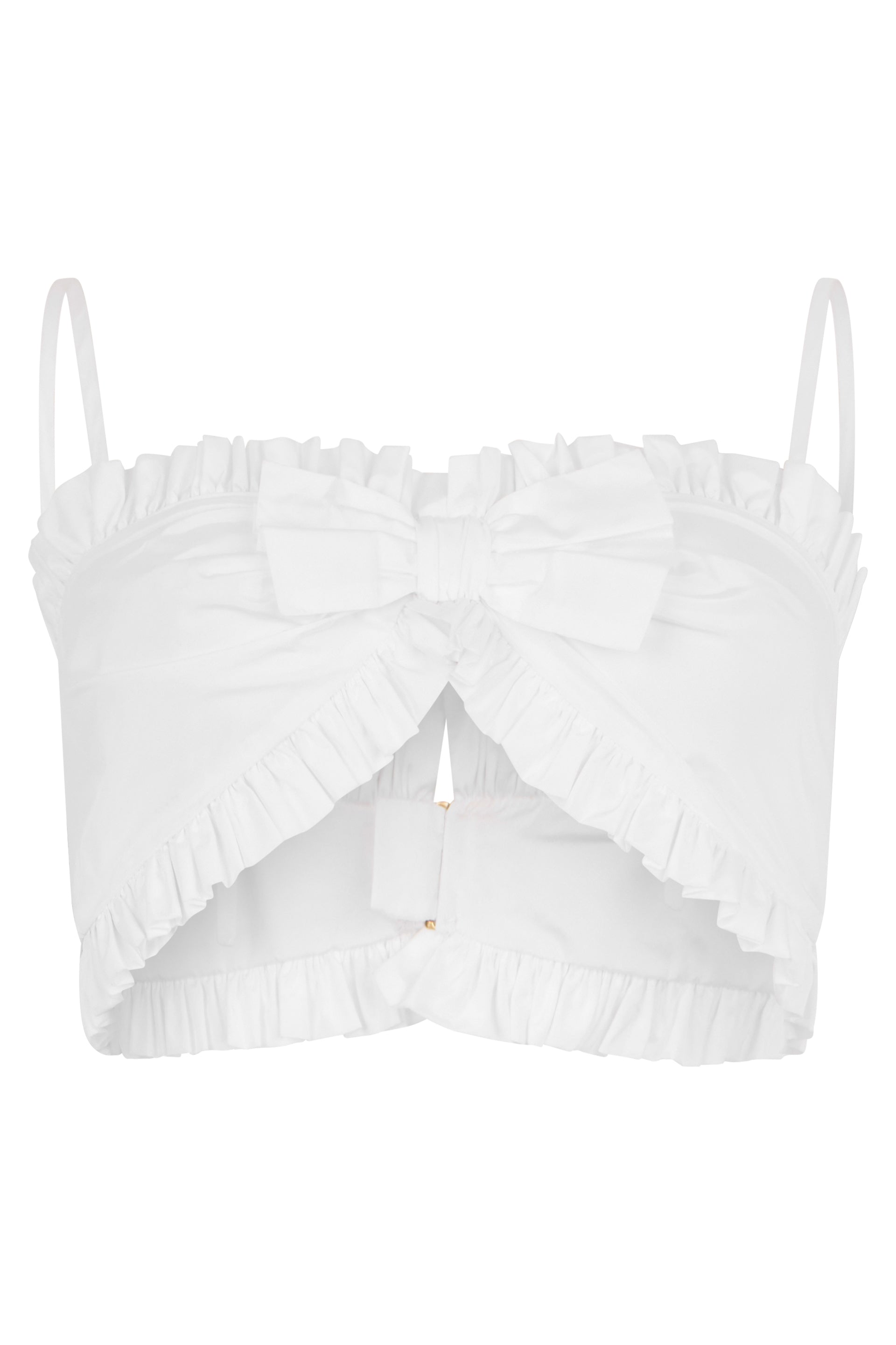 Short white top with thin straps and bow.