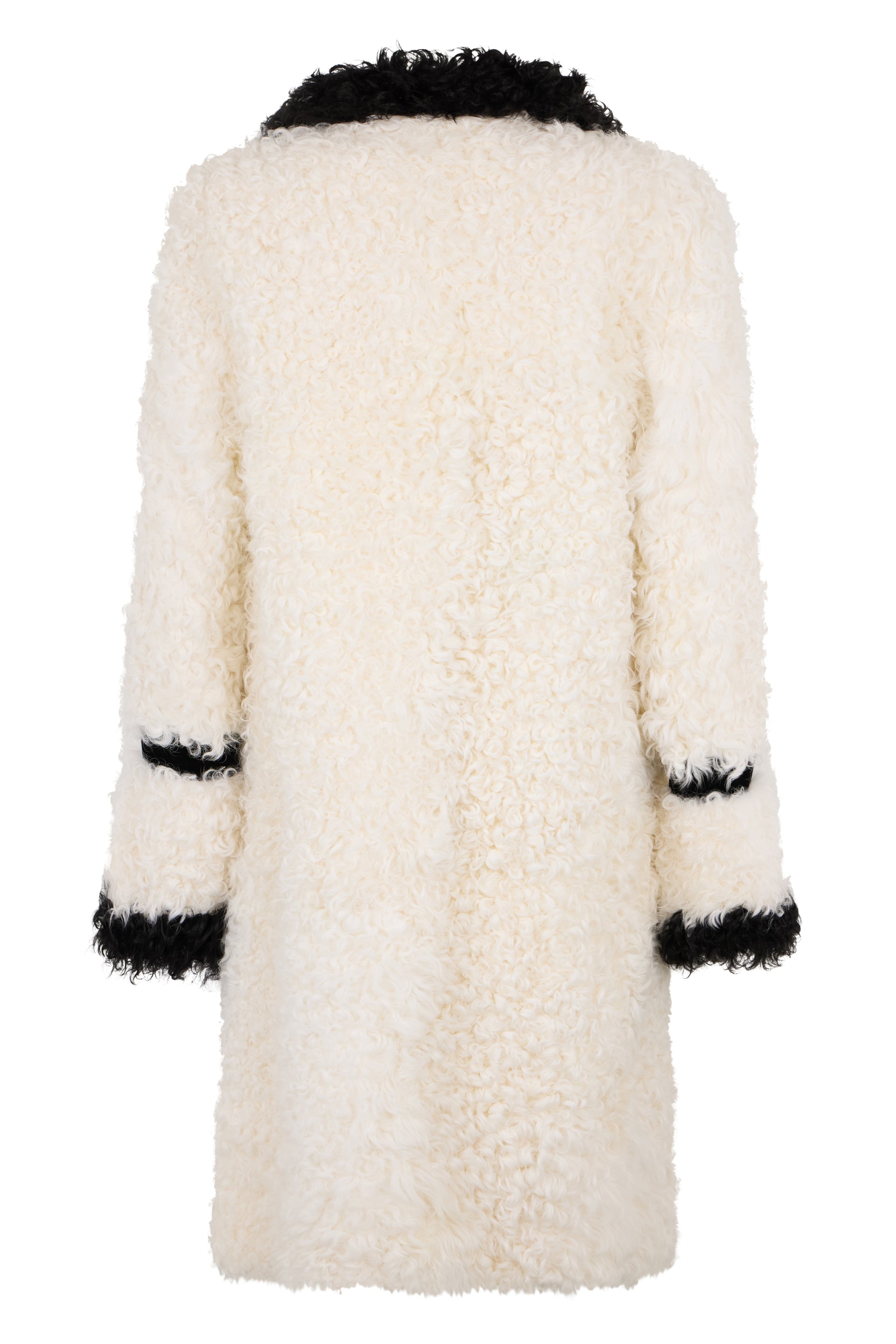 Long coat in white fur with black details.