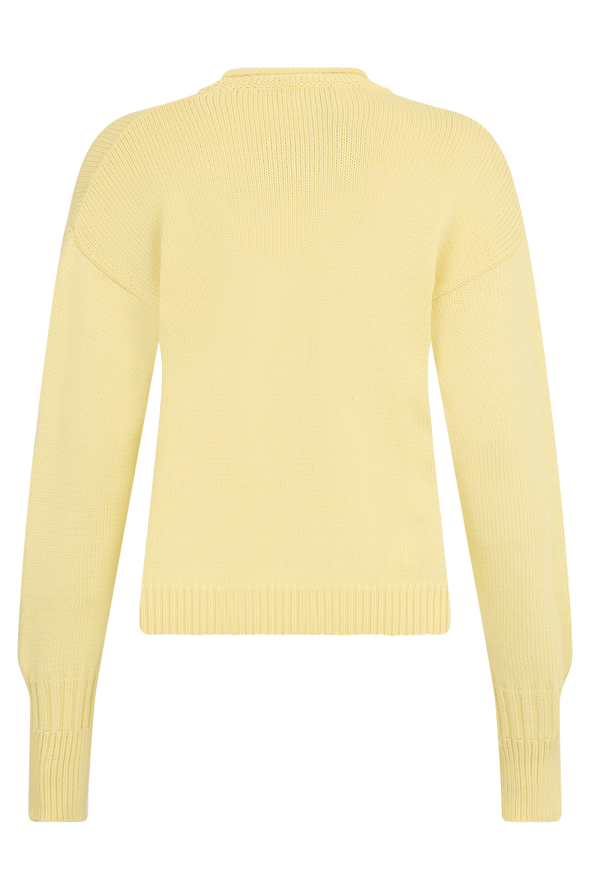 Light yellow sweater with long sleeves.