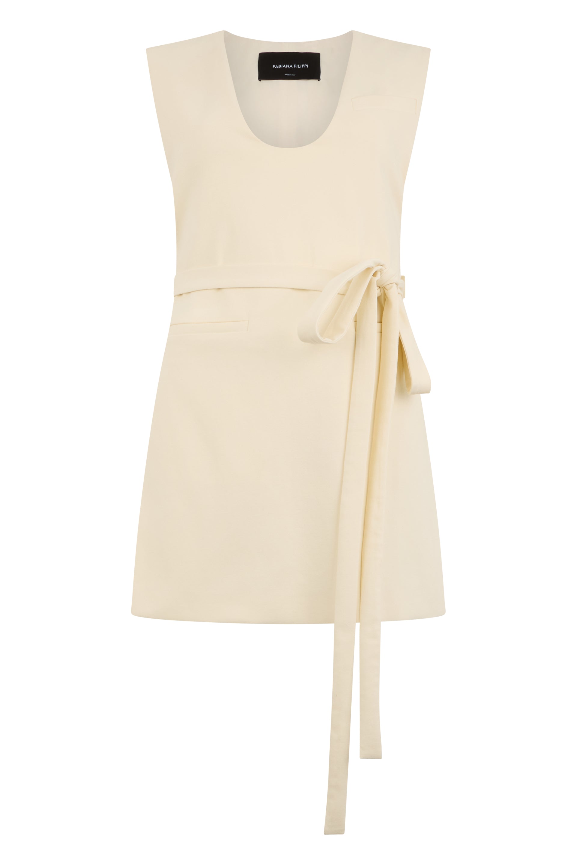 Sleeveless cream dress with elegant belt