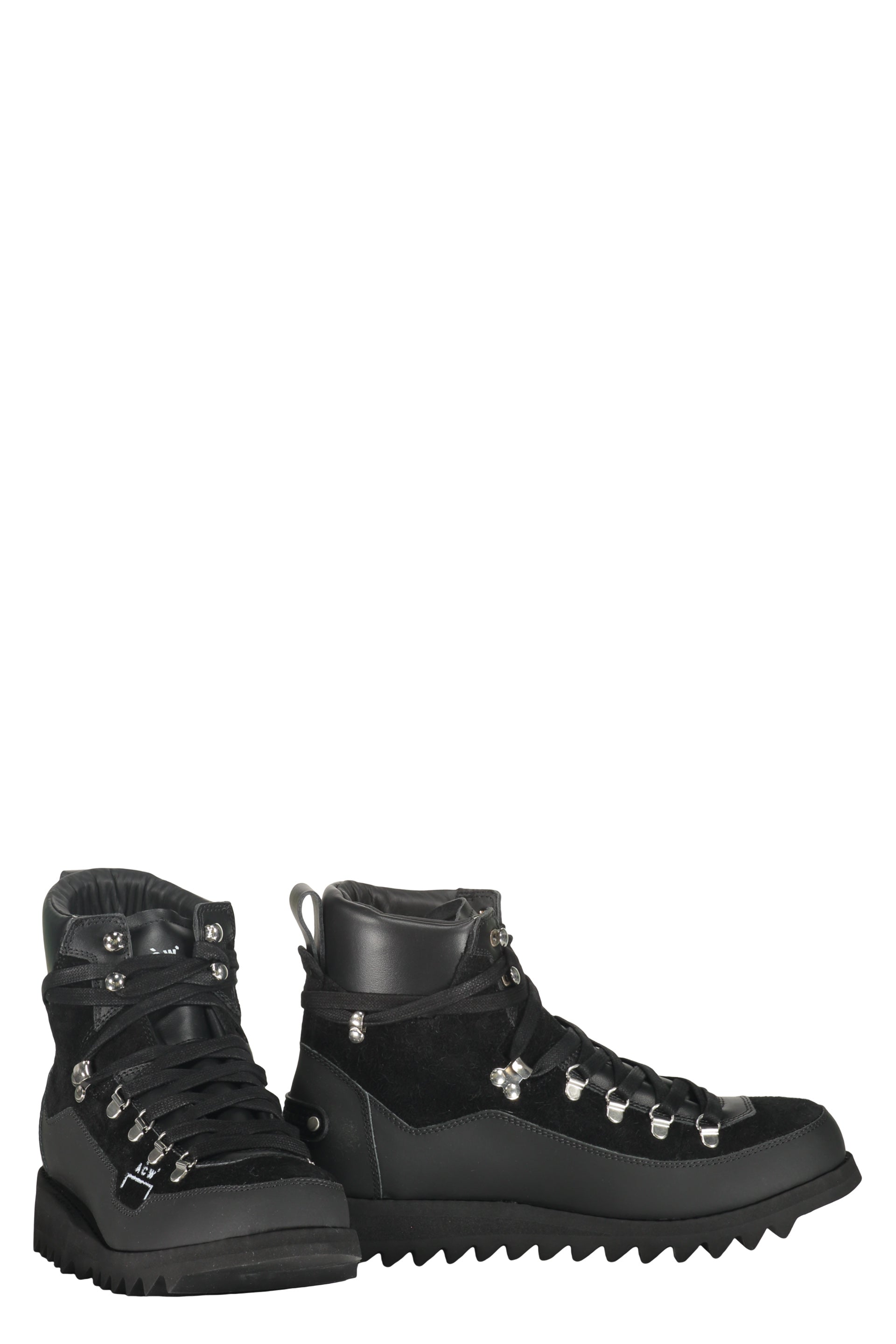 Black high boots for outdoor excursions