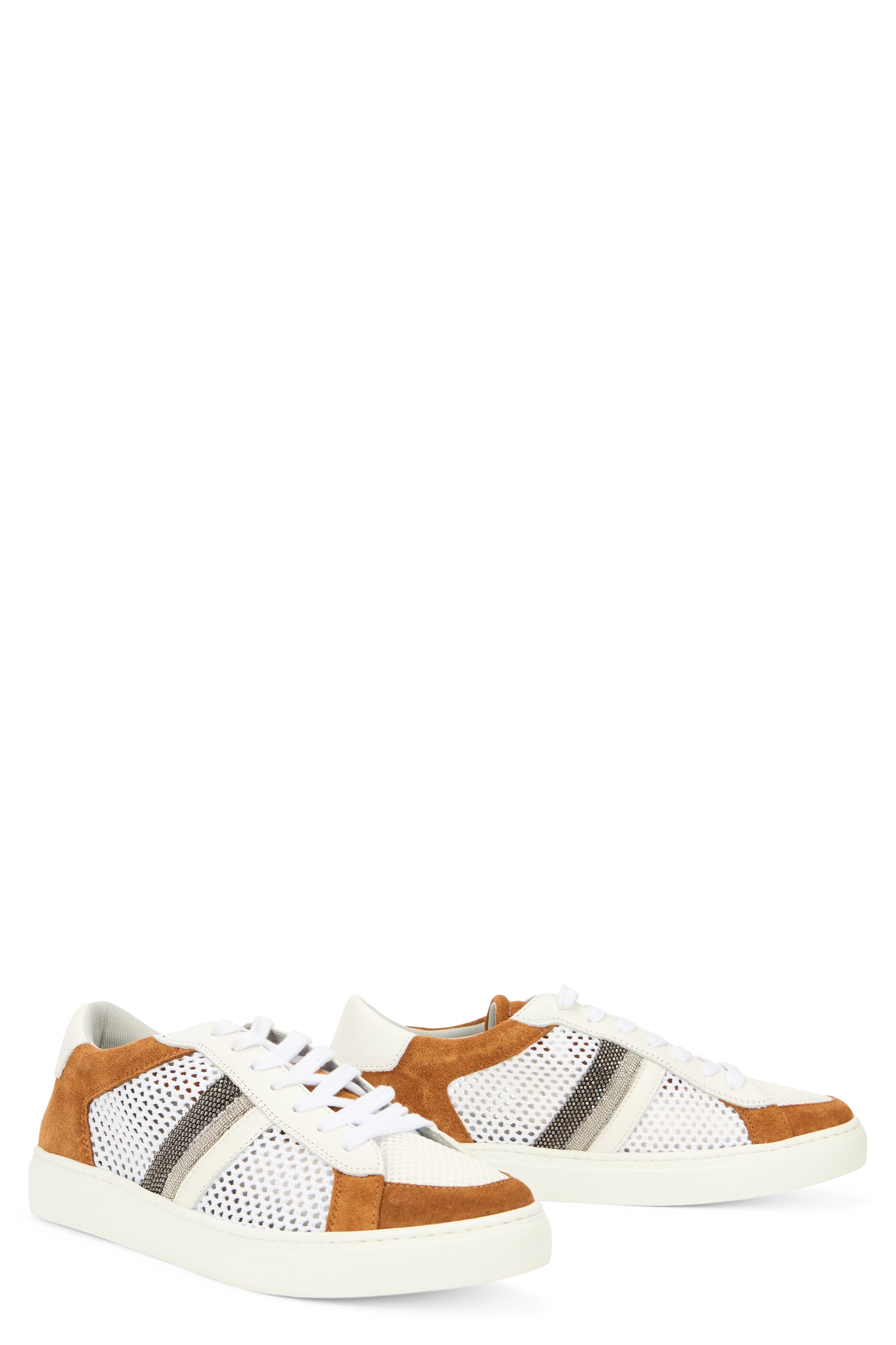 Modern white sports shoe with camel colored details.