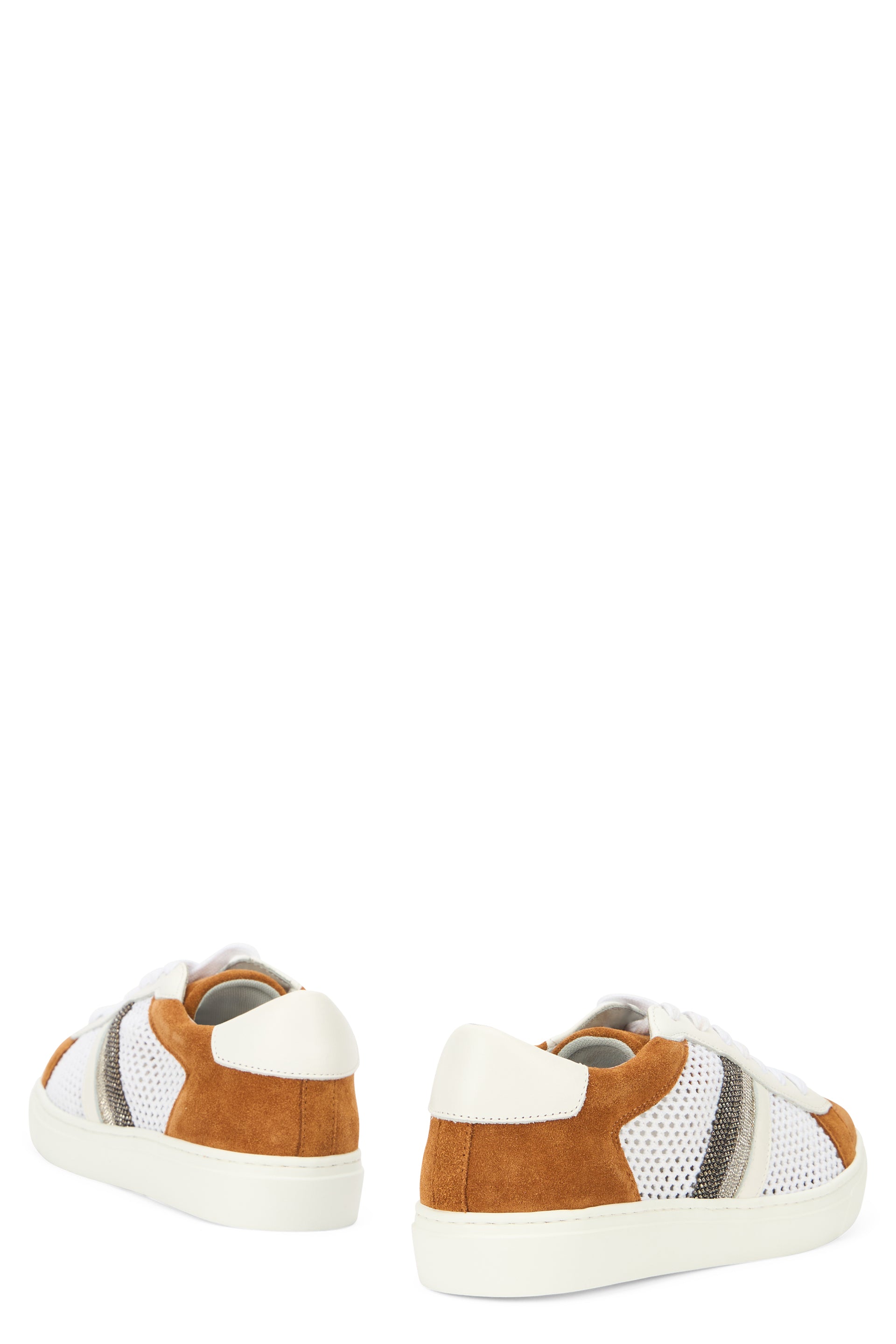 Modern white sports shoe with camel colored details.