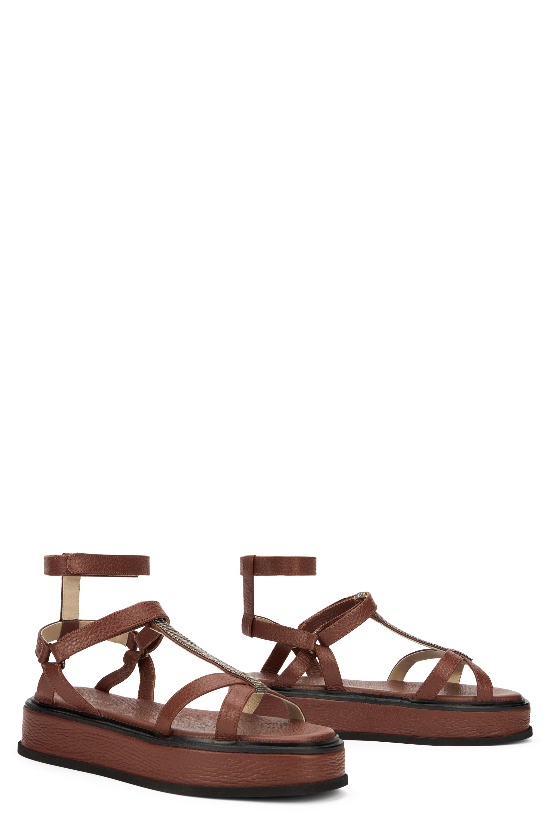 Brown summer sandals with modern platforms with strap closure.