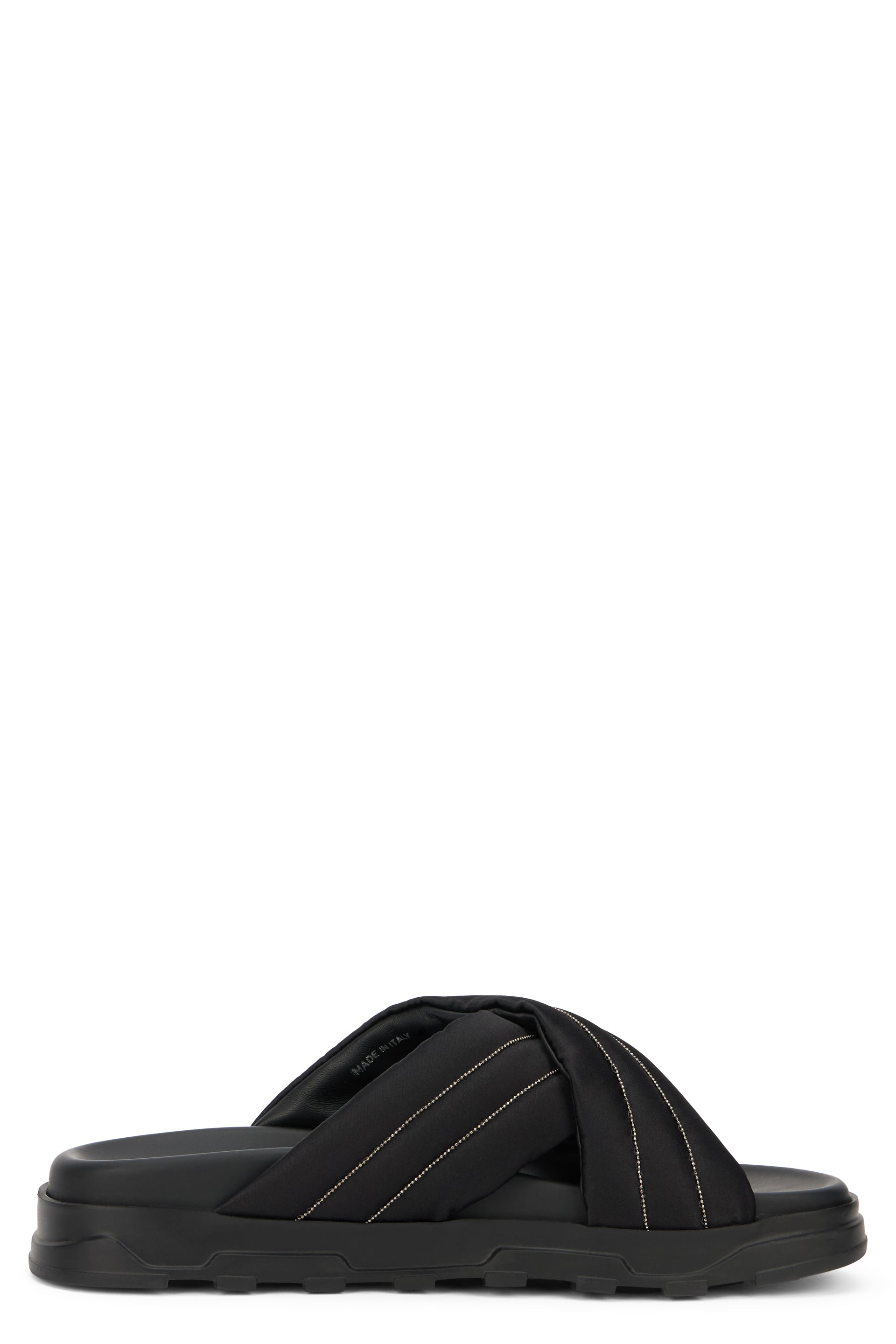 Black platform sandals with a minimal and modern design.