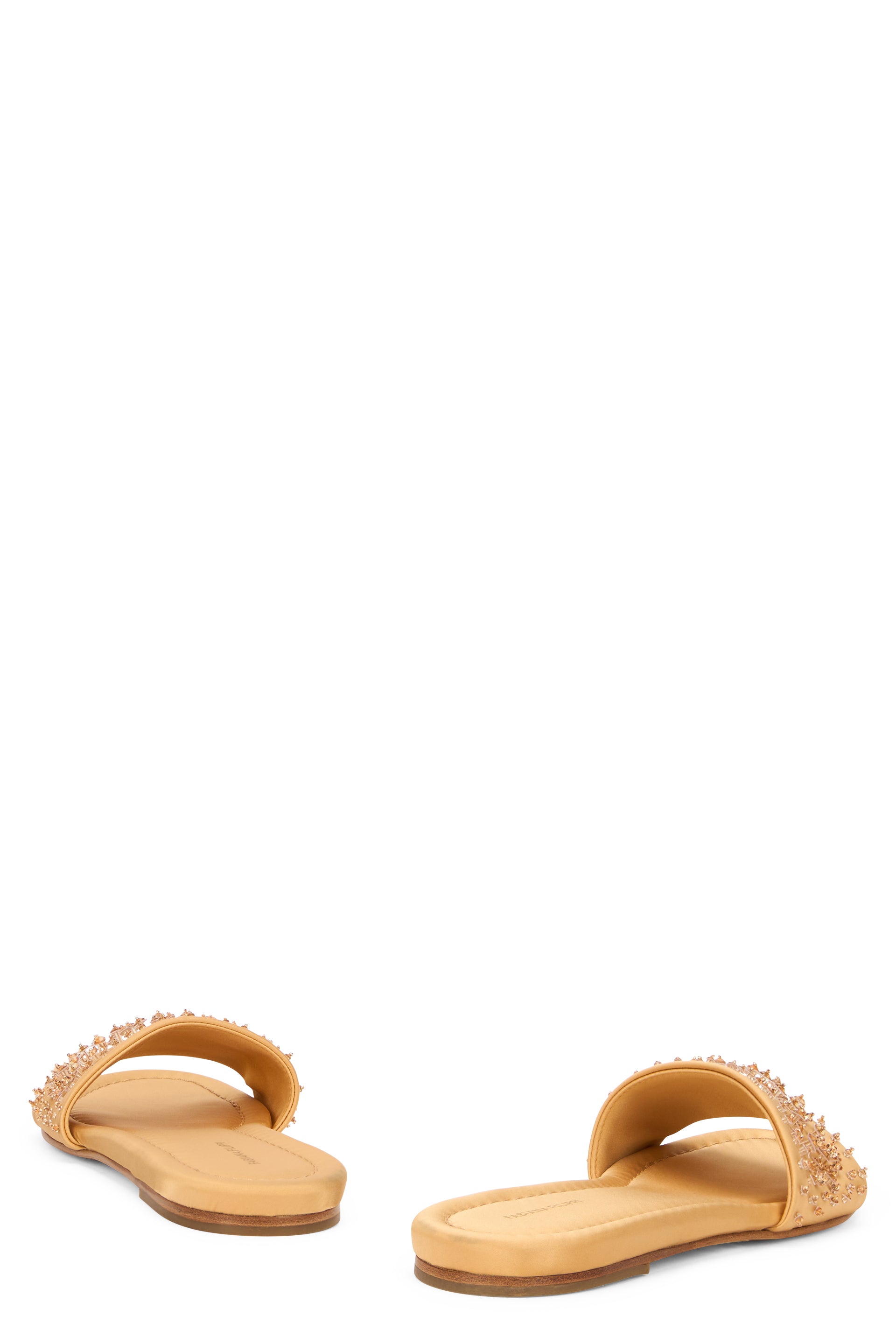 Low sandal with elegant and refined design.