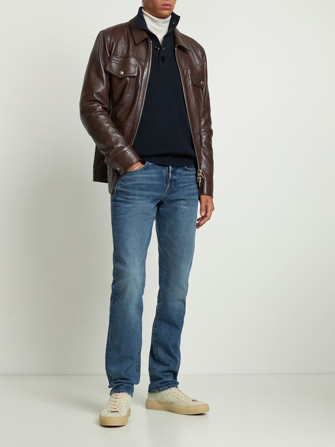 Elegant blue sweater with high collar