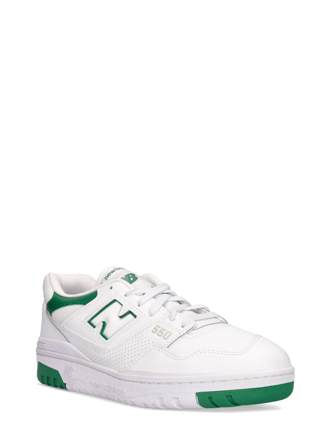 White sneakers with versatile green details