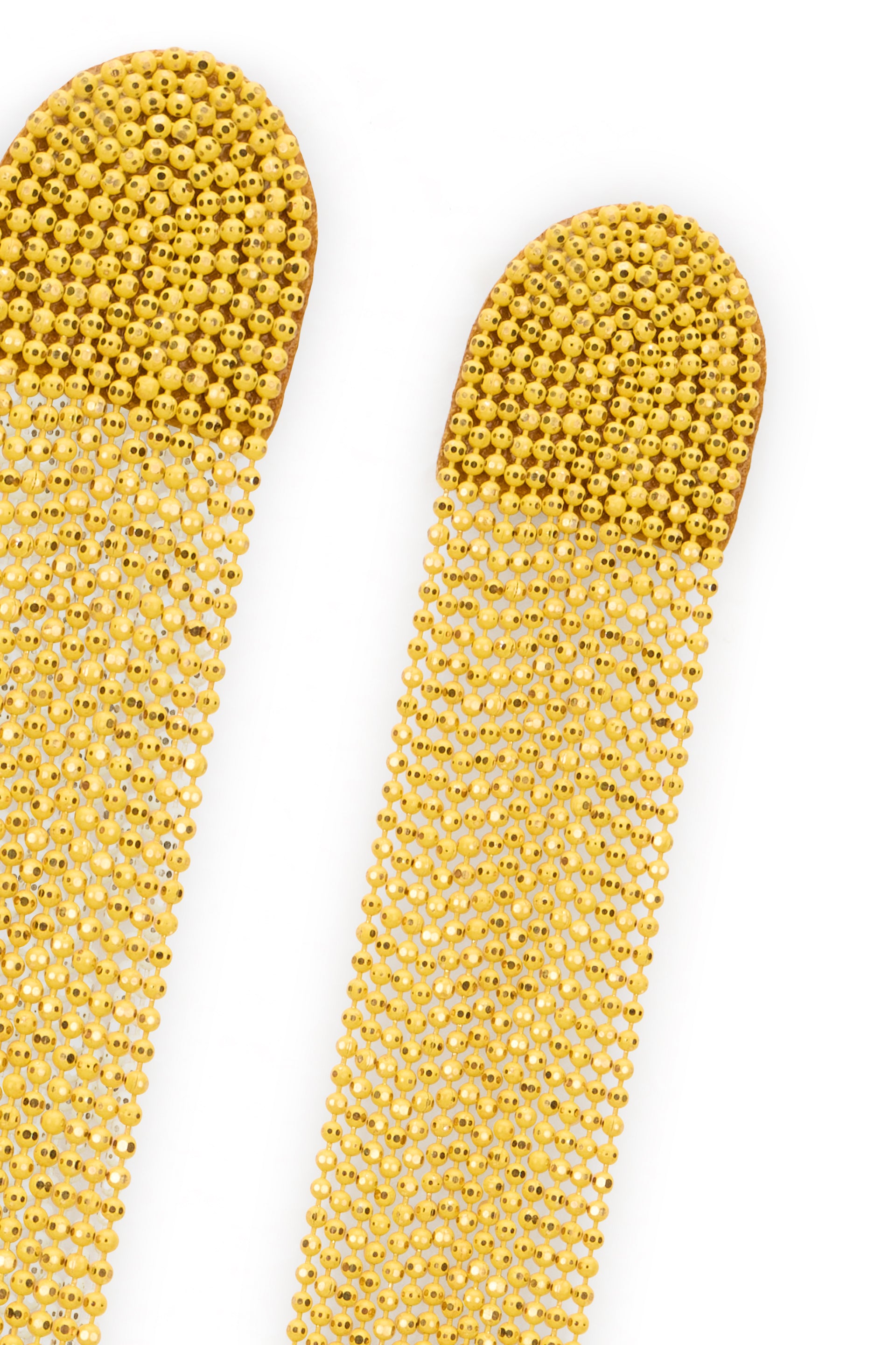 Gold dangling earrings with refined and chic design.