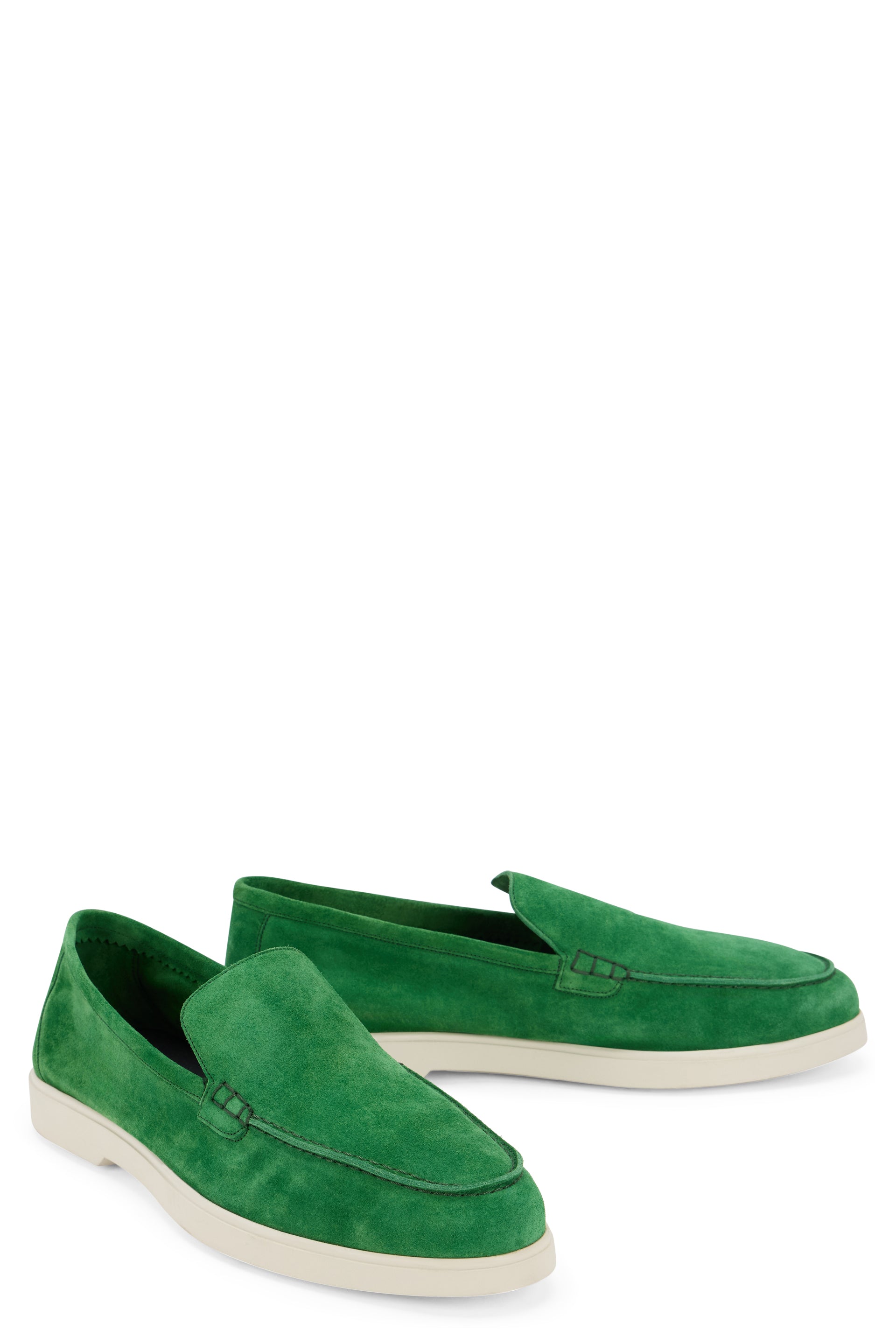 Green modern and versatile slip-on shoes.
