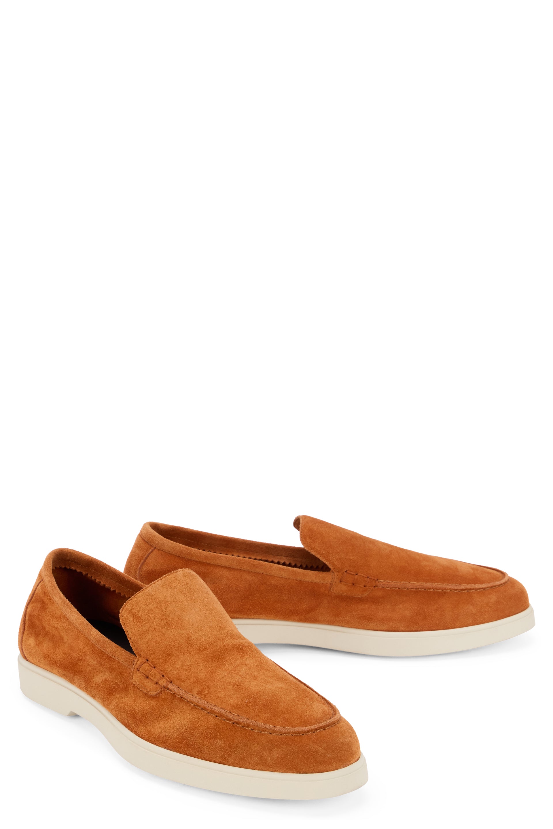 Slip-on shoes in orange color for a casual and refined style.