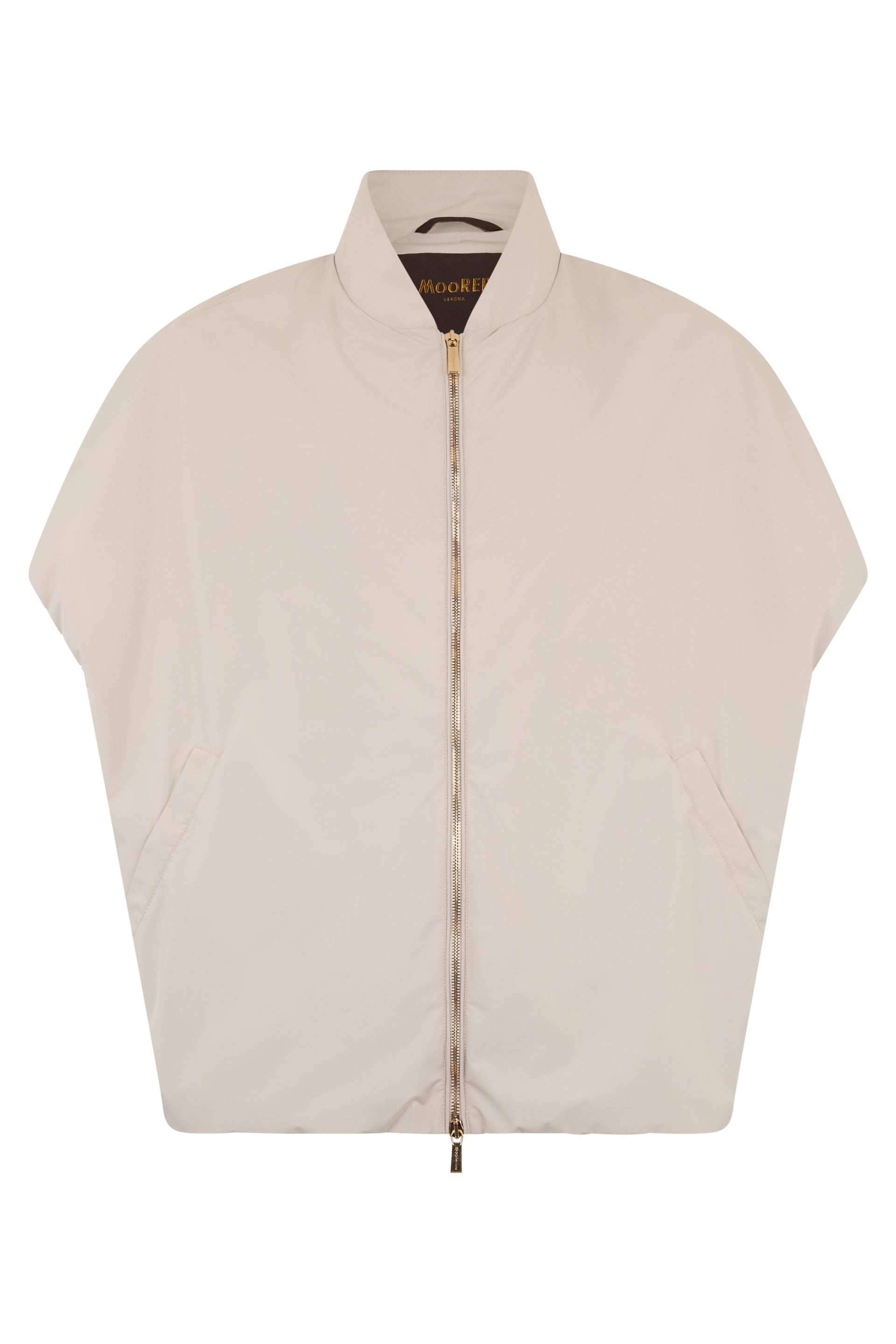 Oversized cape in sand color, light and comfortable.
