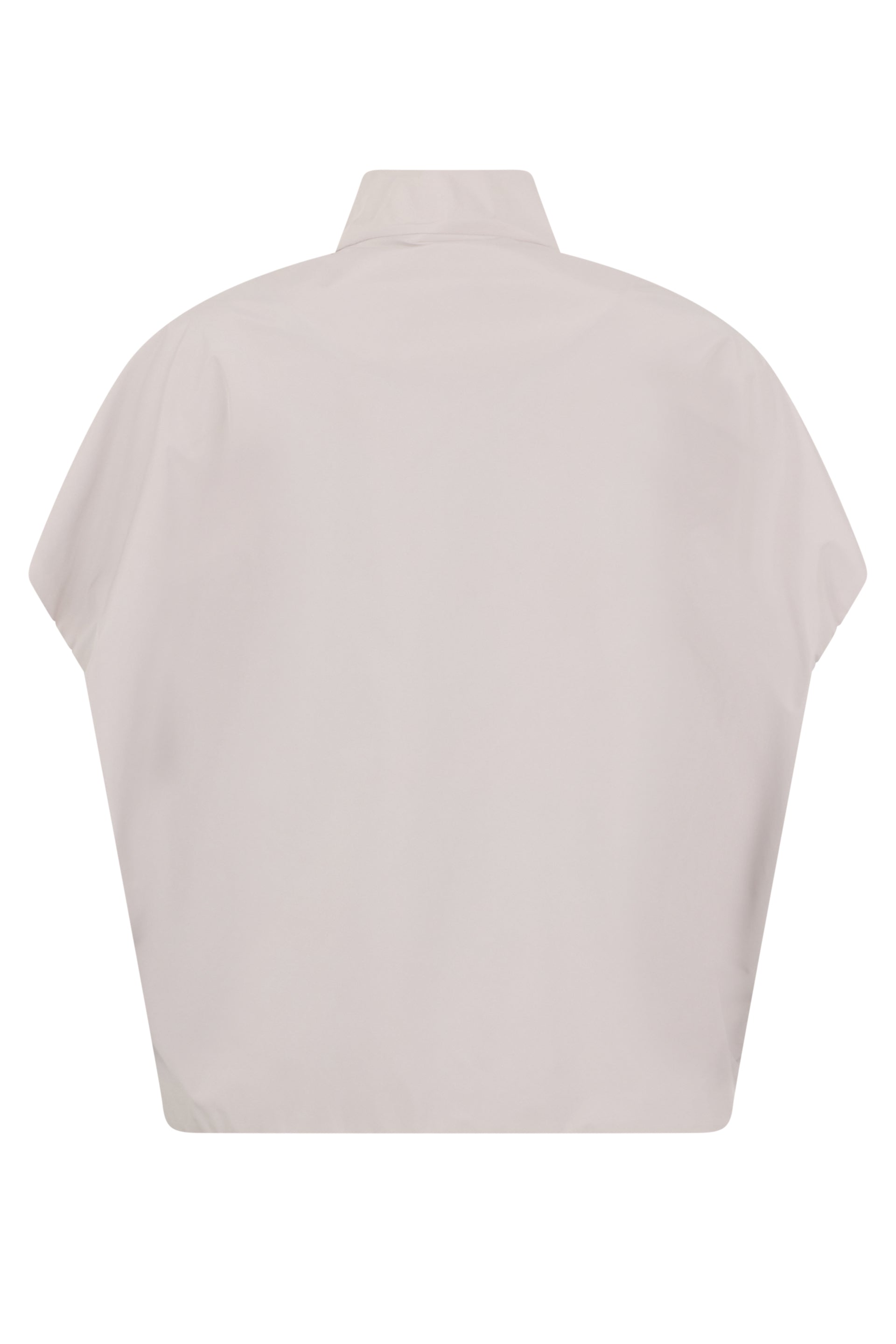 Cape in white cream color with oversized cut.