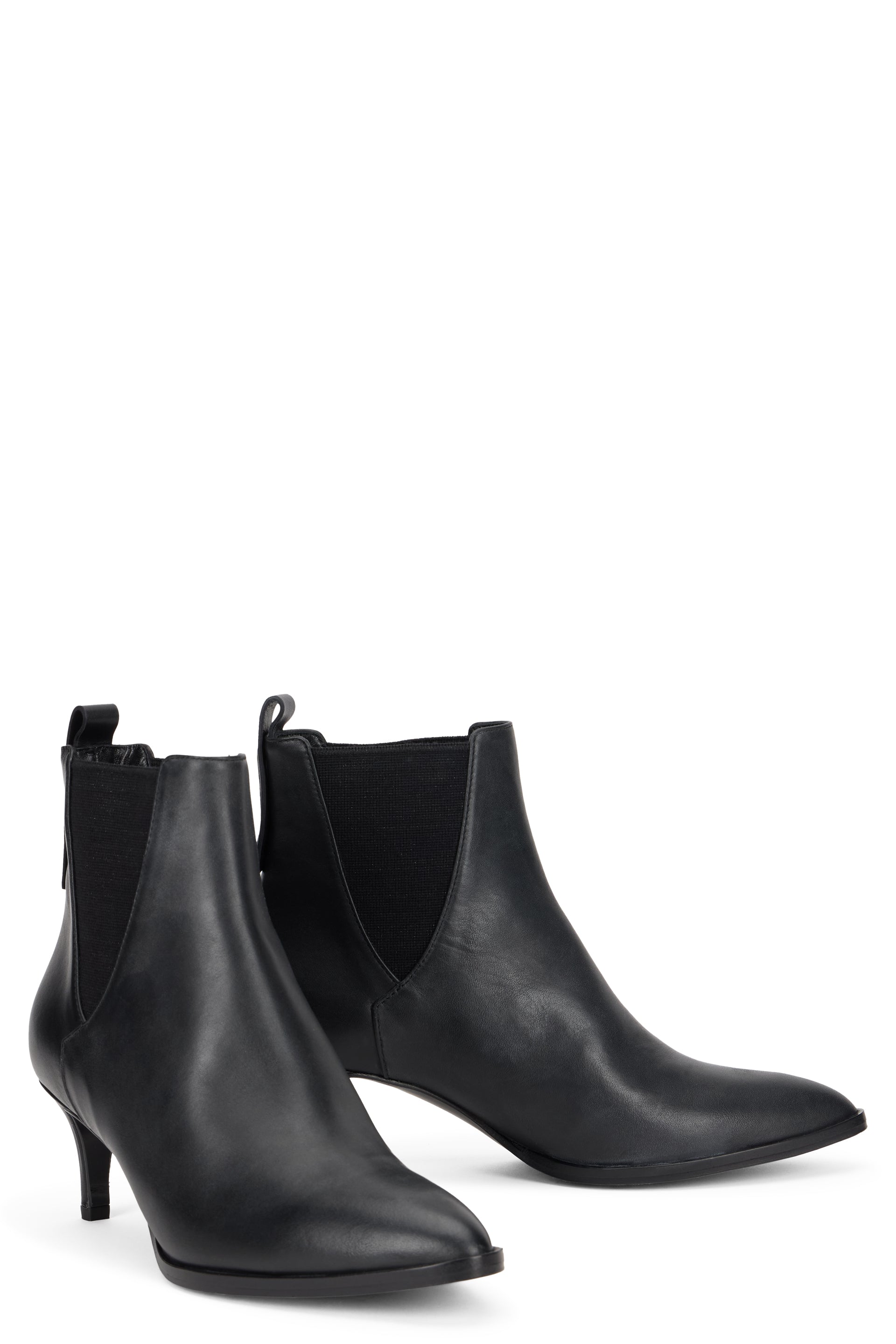 Black ankle boot with elastic insert and heel.