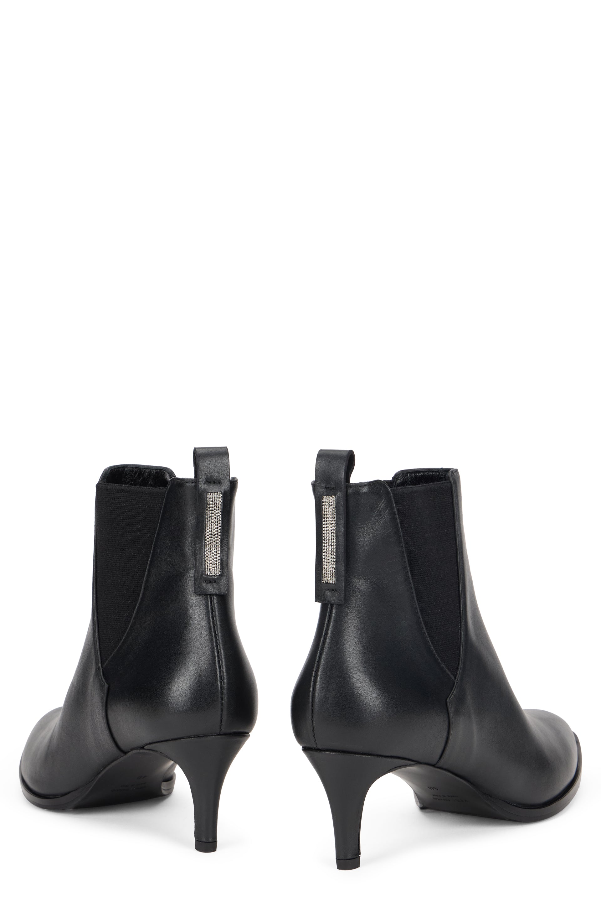Black ankle boot with elastic insert and heel.