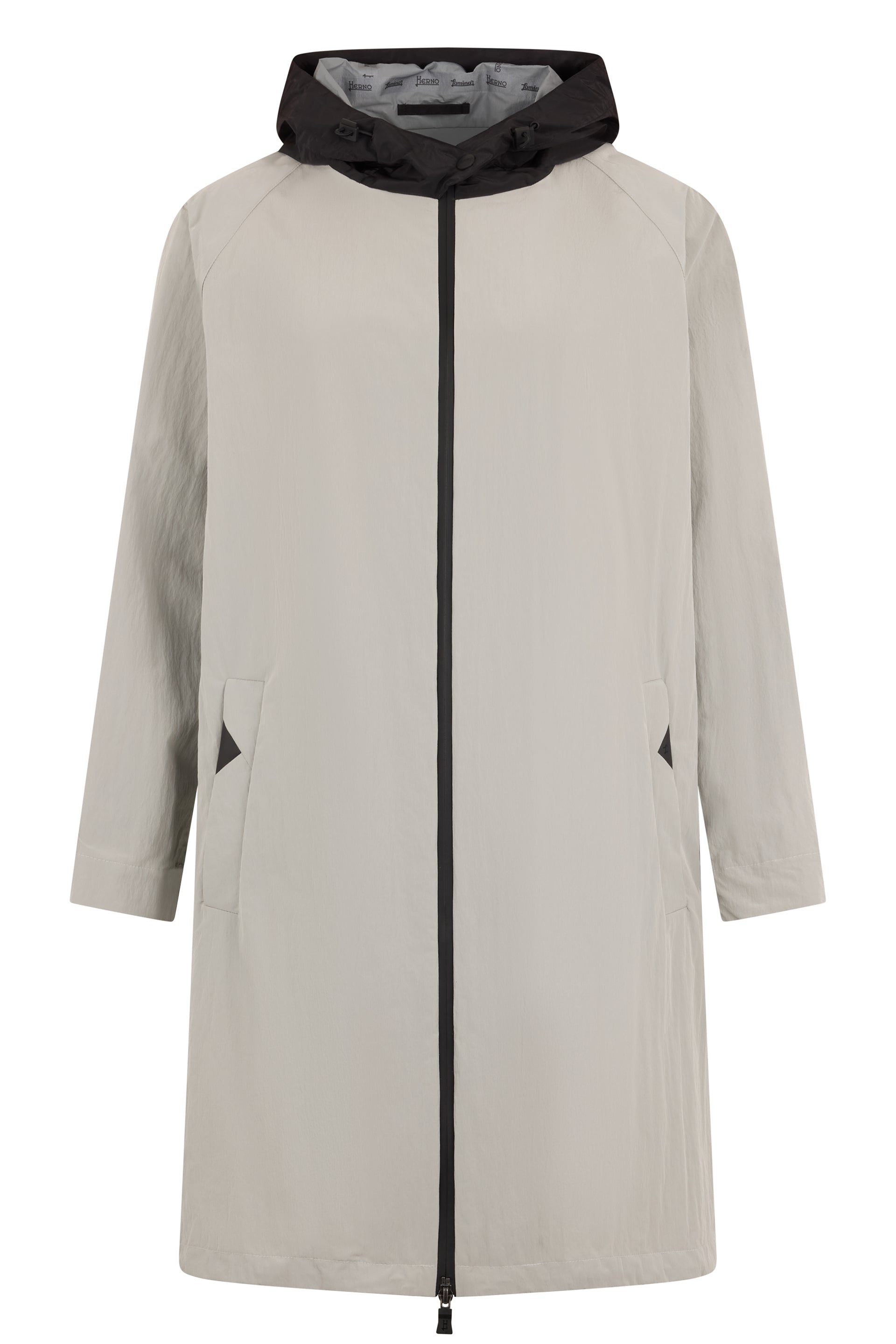 Beige minimalist windbreaker with black details