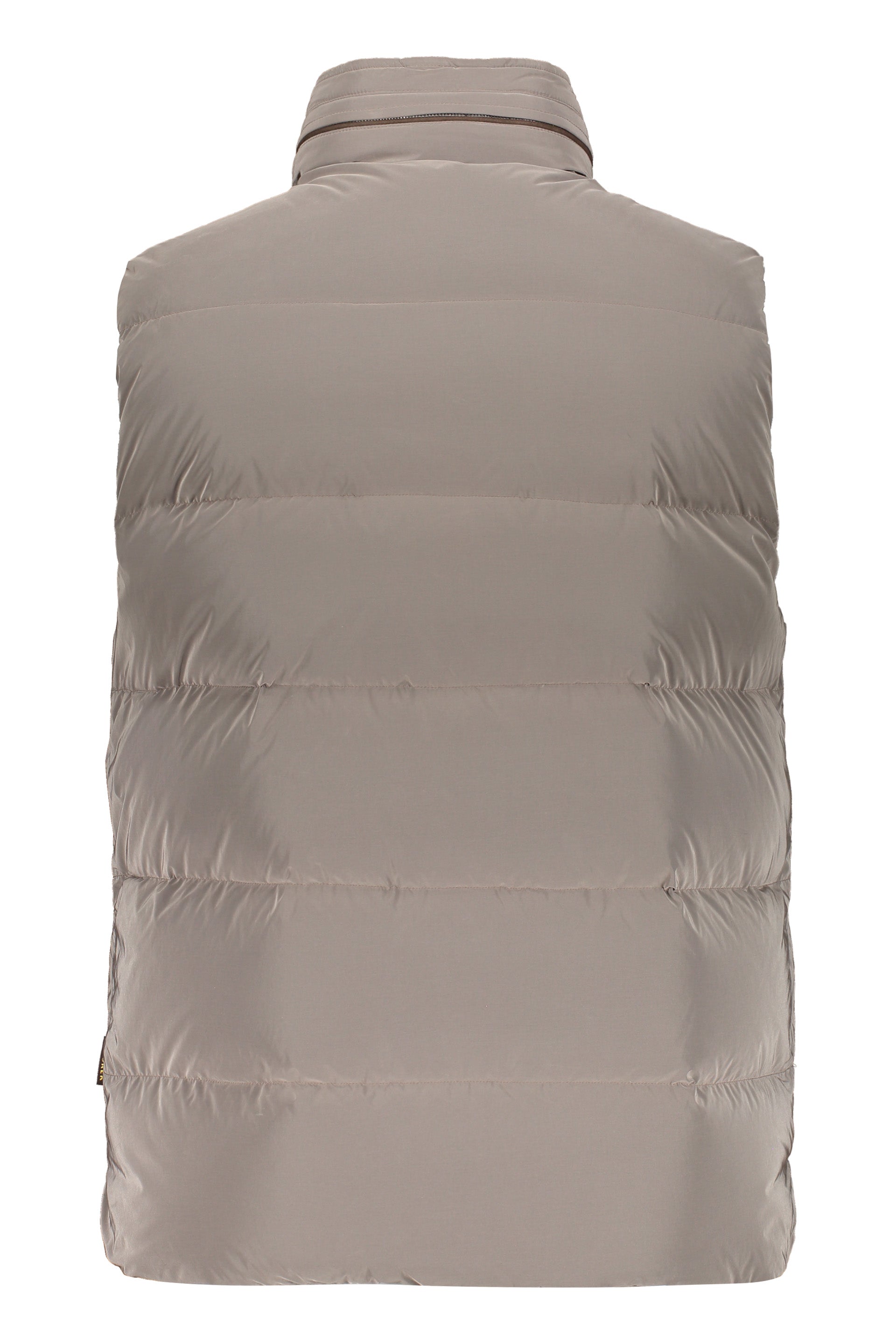 Beige padded vest elegant and versatile