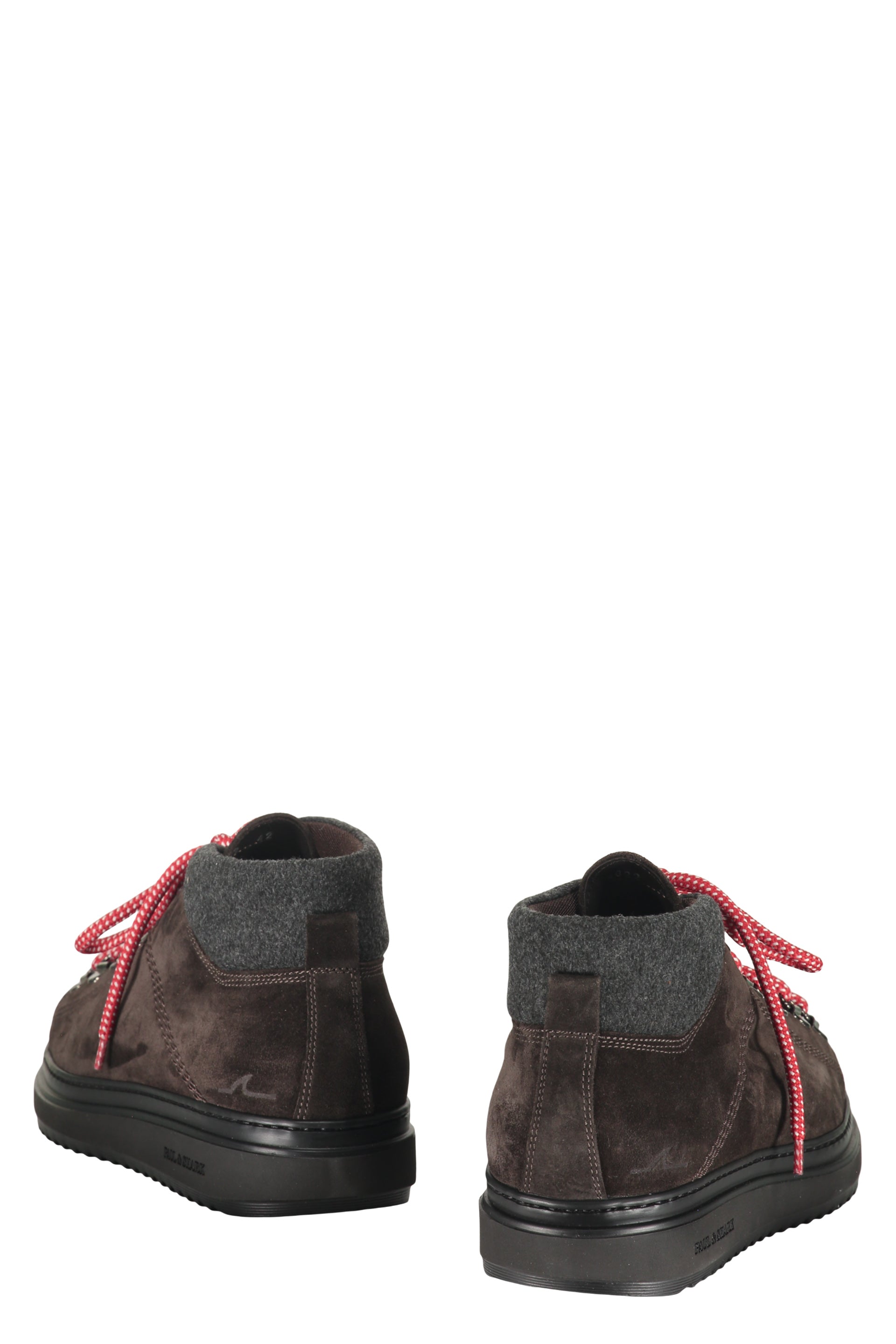 Brown high boots with modern red details