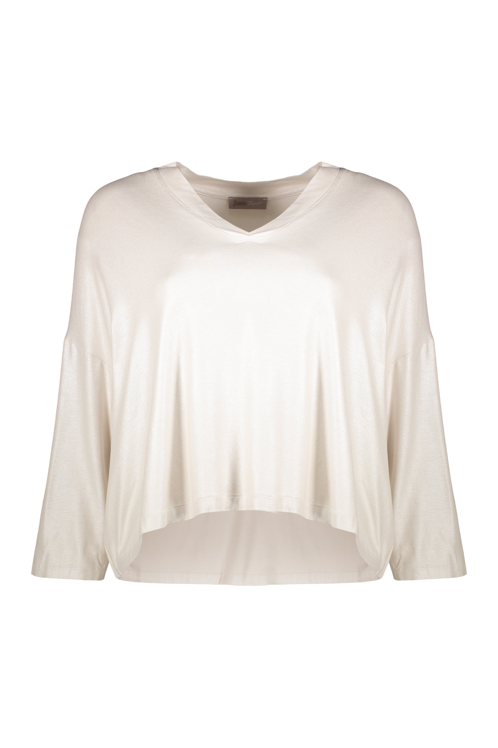 Neutral cropped blouse with long sleeves